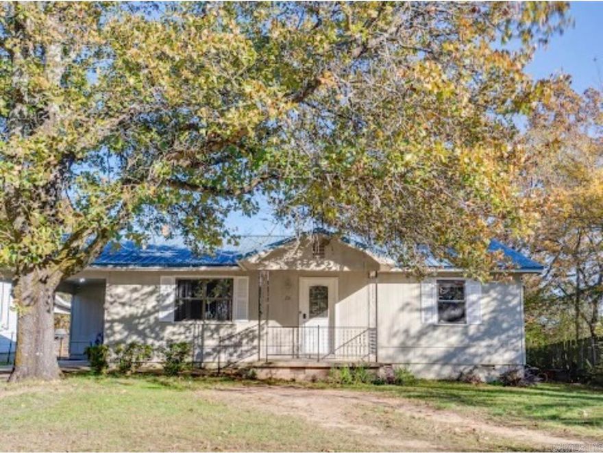 Check out this spacious two bedroom with a lake view!!! Located in southeast Conway just 3.5 miles off I-40, you can enjoy the conveniences of the city without the restrictions, and even better, it can qualify for 0% down rural development loans! This hilltop home has a metal roof, a nice sized front yard and back yard that is fenced in, large bedrooms, a roomy bathroom and a big laundry room with extra storage. The kitchen has plenty of cabinets and counter space and is open to the dining room, which leads outside to a covered back porch and patio facing Lake Conway, perfect for backyard barbeques or enjoying the sunrise over the water. Admittedly, the house can use some aesthetic work, but it's been trouble free for the owners and gives the buyer a chance to add their own personal style with a more affordable than average up-front price. There is a very good chance that this home will have cheaper monthly payments than what your current rent is, so why not invest in your own home instead?