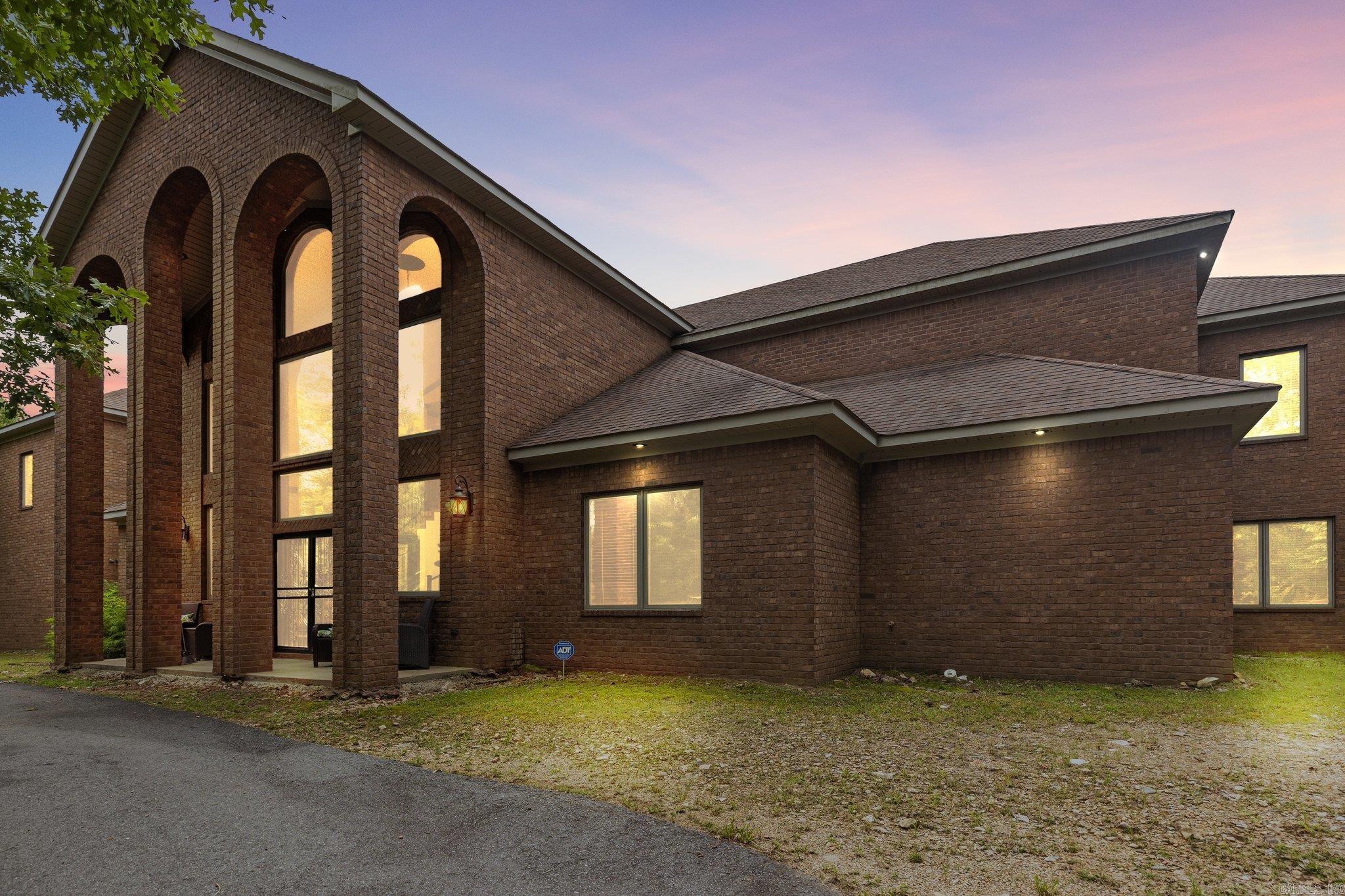 ***Owner Financing is available- contact me for more information 501-425-2098.  Welcome to this beautiful Oasis, 6 bedrooms 5 bathrooms with 4 full bathrooms. 2 Luxury Suits ( one upstairs & downstairs- spa area includes sauna) sitting on 3.23 acres. This Luxury homes has a stunning spiral stair case as you enter the front door. 12 foot ceilings, a game/fitness room, movie theater room. A massive kitchen with all new appliances, separate wet bar area. This amazing home also features an office, 3 Fire places, with a 6 car garage. Comes visit this luxury home that sits on acreage with lots of privacy. Call today for a showing!!