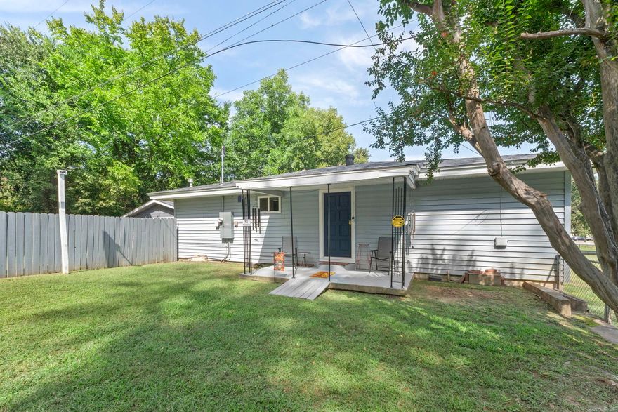You will not find a better cared for home anywhere! BUYERS SEE PROPERTY INFO SHEET IN THE DOCS SECTION. Welcome to this charming 2 bedroom, 1.5 bath home in Russellville! Home was remodeled in 2023. New thermal windows (except custom original window in laundry room), new flooring, new fixtures and new paint. HIP roof. Carport has been walled with mold and moisture resistant material. New, 3-ton Rheem Heat Pump split system with 15kw heat strips; has 10 yr parts warranty and 1 yr labor warranty (warranty start date of 9-19-23). Kitchen has new counter-tops and sink. Primary bath features a rain-head shower, new vanity & new toilet. Conveniently located near schools (right across the street!), parks, shopping, and dining. This property is perfect for a first-time home buyer or empty-nesters. The home features a flat, fenced yard that’s great for outdoor enjoyment. Wired for fiber! Affordable and move-in ready, this home is a wonderful opportunity in a fantastic location! AGENTS SEE VERY IMPORTANT REMARKS.