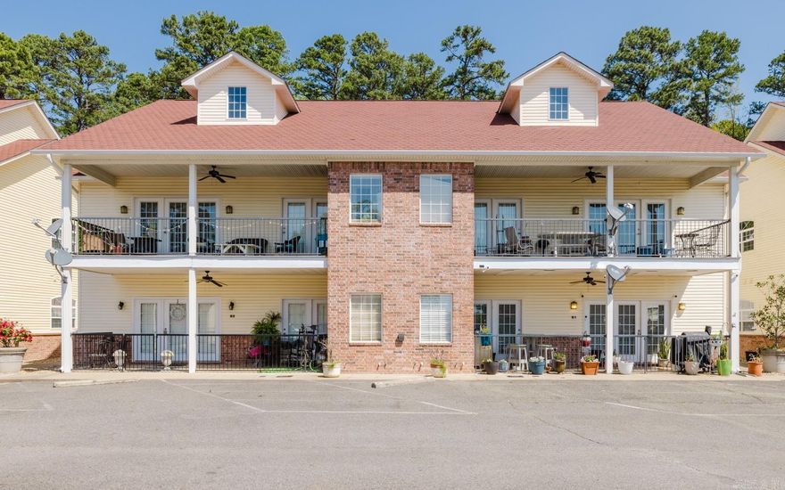 Welcome to your lake getaway. This well maintained 2 bedroom, 2 bathroom condo offers 1,400 sq ft of living with views of Lake Hamilton. Enjoy your morning coffee overlooking the water, spend the day boating or swimming, and cap it off with lakeside dining—all from this centrally located slice of paradise. Ending the day with sunset cruises can be your new thing!  Schedule your private showing today and start living the lake life!