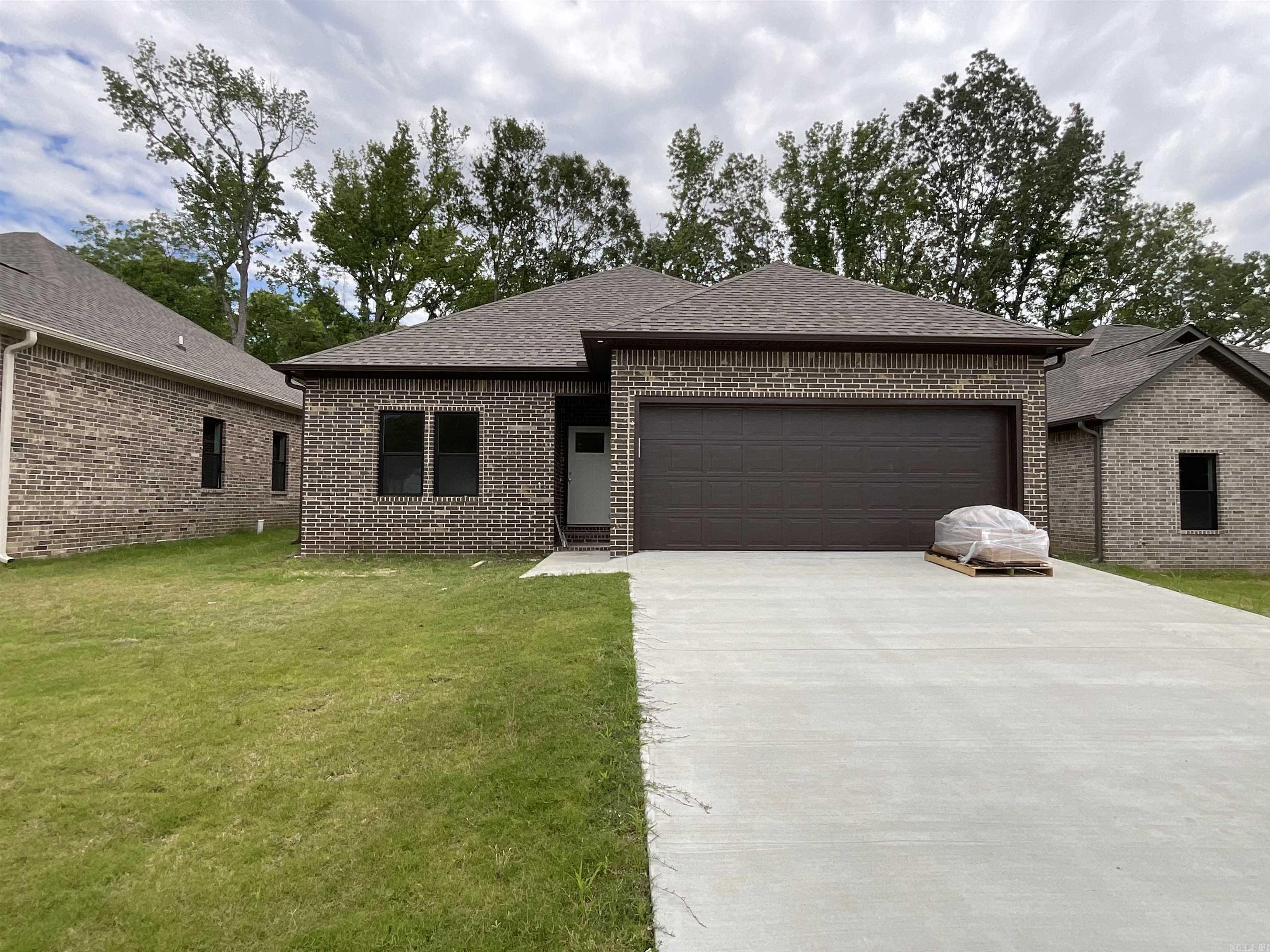 This beautiful NEW CONSTRUCTION home has modern detailing and fixtures, with neutral cabinets to set them off! Neutral throughout, but warm and welcoming! Nestled in the most convenient spot of Jacksonville, this home is close to Little Rock Air Force Base, shopping, and has several ways to access the interstate within a few blocks! Great-sized backyard, all wood cabinets, solid-surface countertops, and 9' ceilings (and vaulted in the living room)! Multiple houses, so bring a friend to be your new neighbor! Agents, please see remarks.