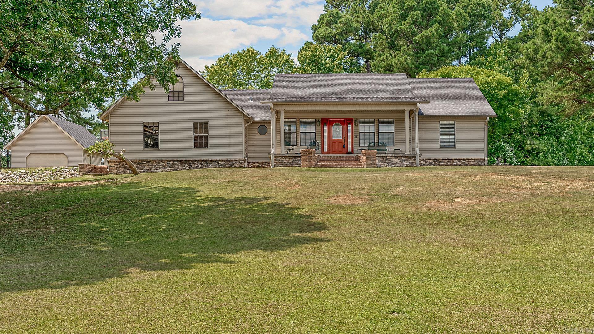 Where comfort meets country charm! This spacious 4-bedroom, 3.5-bath home with bonus room sits on 2 beautiful acres with a shared pond, an attached 2-car garage, and a 20x20 detached shop with electricāperfect for hobbies or extra storage. Step onto the large covered front porchāideal for your morning coffeeāand walk into a bright, welcoming entryway that opens into the heart of the home. Youāll love the new luxury vinyl plank flooring flowing through the main living areas and 3 bedrooms on the first floor. The kitchen is made for gathering with ample cabinets, prep space, and easy access to the back deckāready for weekend grilling and outdoor fun. The primary suite is your personal escape, complete with French doors to the deck, a huge bathroom with a jacuzzi tub, walk-in shower, double vanity, and oversized closet. Upstairs has been thoughtfully renovated and features an additional bedroom, full bath, and bonus roomāperfect for guests, a playroom, or home office. This home checks all the boxesāspace, style, and serenity just outside the city!