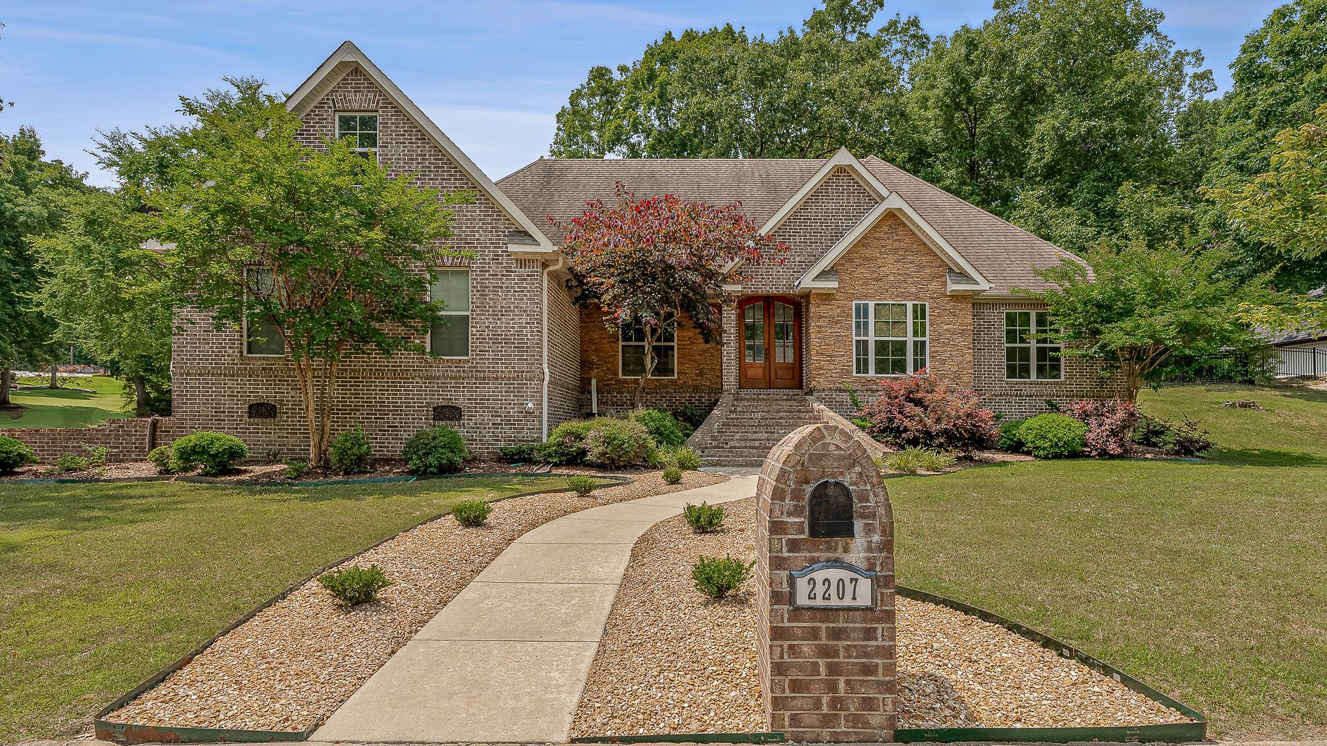 Beautifully maintained 4-bedroom, 3.5-bath home on a spacious corner lot with nearly 3,000 square feet of living space! This all-brick home features hardwood flooring, granite countertops, maple cabinetry, and fresh interior paint throughout. The main level includes three bedrooms, while the large upstairs bonus room doubles as a 4th bedroom with its own full bathāideal for guests or a private retreat. Enjoy updated lighting in select areas, freshly landscaped grounds, and a cozy firepit on the back patio. The side-entry double garage adds convenience, and the stained wood double front doors offer a warm and timeless first impression. Stylish, spacious, and move-in ready!