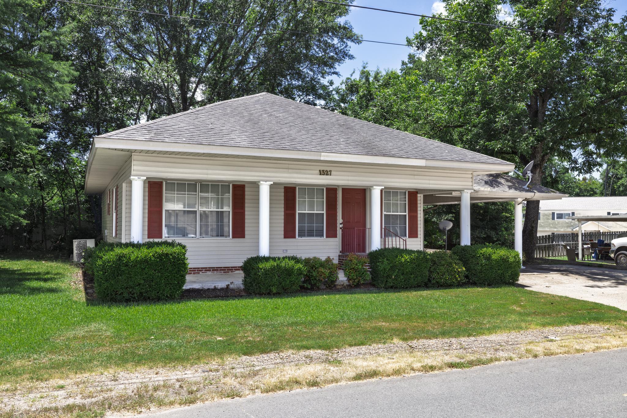 This beautifully rebuilt three-bedroom, two-bath home, completed in 1999, offers a spacious and inviting layout perfect for comfortable living. The home features tall ceilings that enhance the open and airy feel throughout the main living spaces. An open-concept kitchen and living room create the ideal setting for entertaining or relaxing with family. The bedrooms are generously sized, each with oversized closets providing ample storage. Outside, a small fenced-in backyard offers privacy and a low-maintenance space to enjoy the outdoors. This home is a perfect blend of modern design and everyday functionality. Agents see agent remarks.