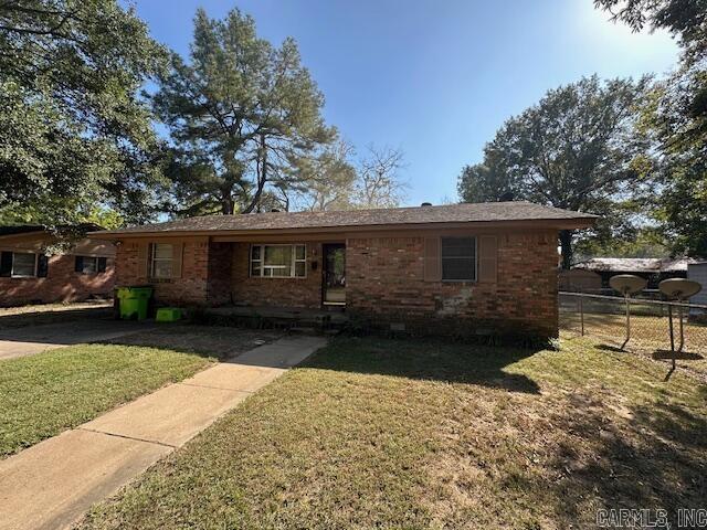 Are you looking for a weekend project? Come see this spacious 4 bedroom 2 bath home with over 1,800 sq. ft. Split floor plan, 2 living areas, WBFP, eat in kitchen, laundry room with extra space for pantry or storage. Fenced backyard, the home sits on 55'x85' lot & there is an additional 70'x110' lot included. Sq. Ft. is approx. measuring is encouraged.  ****THIS HOME IS BEING SOLD AS IS WHERE IS****