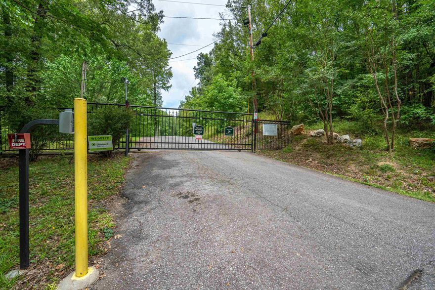 Overlooking the Ouachita River this 3.09 +/- prime residential lot is the perfect spot for your private estate.   Gated Development with close proximity to White Water Park and 15 minutes from Hot Springs and 5 minutes from Malvern.  Easy access to I30 and commute east or west.  The fist step to building your dreams is making this lot yours today.