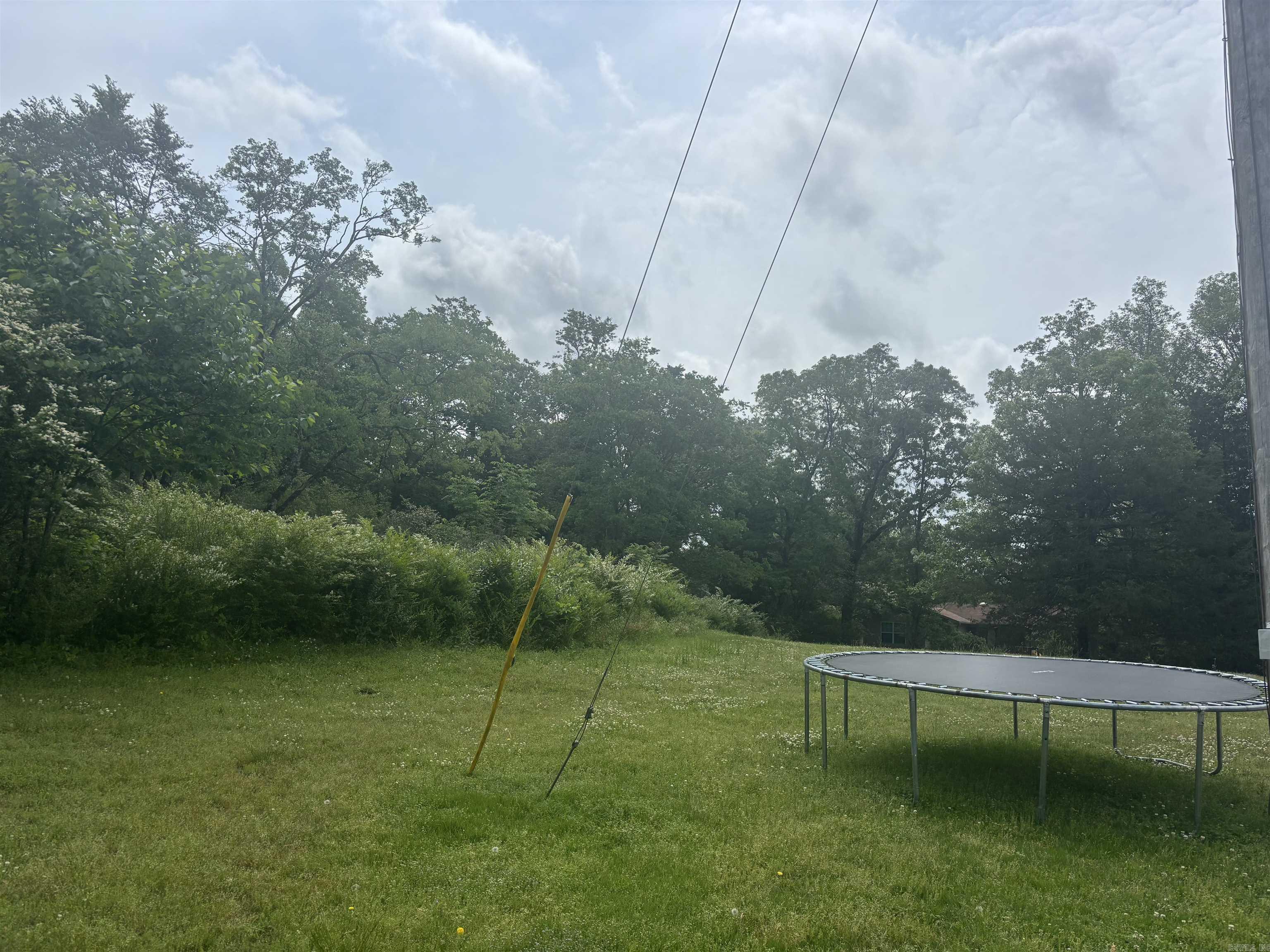 Vacant lot ready to build your dream home in the Cedarwood Subdivision and close to Lakeside schools! City water and Entergy available and already at the road. Trampoline belongs to the neighbors and will be removed. Property starts at the power pole. Partially cleared, great building site!