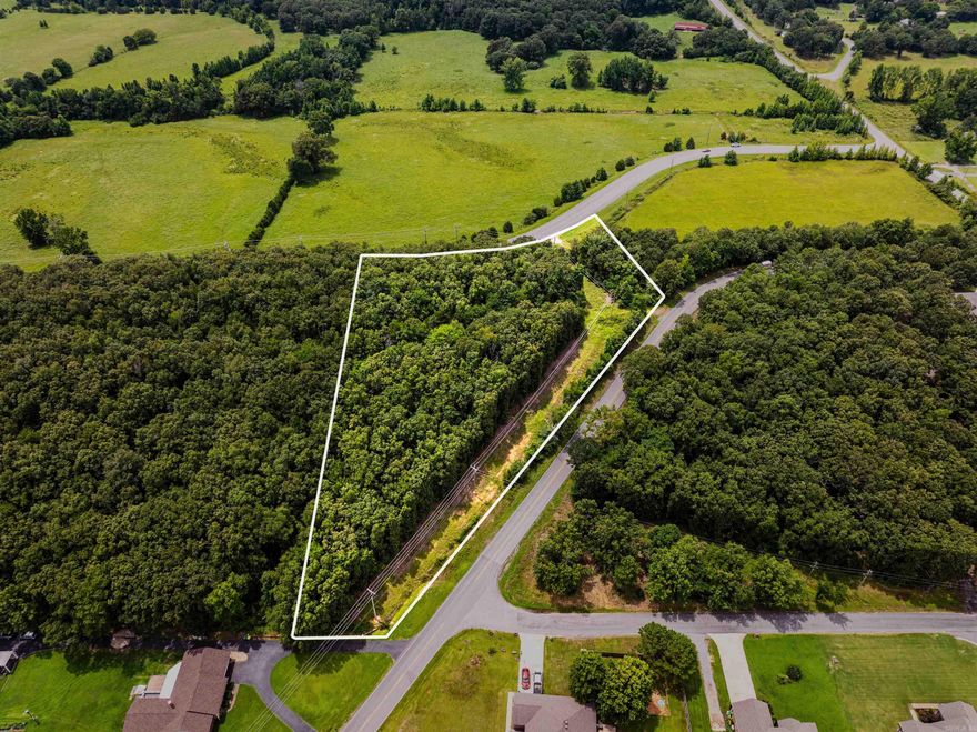 Escape the hustle and bustle without giving up convenience. This is Lot Three of Seven premium tracts of land we are offering, each three acres more or less with a blend of open fields and serene wooded areas-perfect settings for your dream home!  *Beautiful Building Sites  *Utilities Already in Place  *Percolation Tests Completed  These tracts are ready for you to build the lifestyle you've been envisioning. Don't miss the chance to secure your piece of peaceful living just minutes from the city