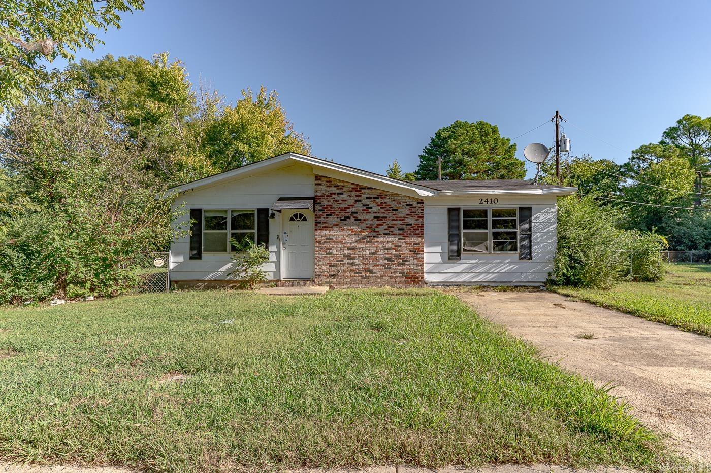 Investor Special – Potential Income-Producing Property! Welcome to 2410 Westacre Dr in Jonesboro, a 3-bedroom, 1-bath home offering approximately 1,224 sq ft of living space. This property features a solid layout with a functional floor plan and a durable construction design that’s ideal for long-term rental performance. Tenants pay all utilities, keeping operating costs low and maintenance simple for investors. Located in a steady rental area with consistent tenant demand and convenient access to schools, shopping, and major highways, this home provides dependable returns and long-term growth potential for any portfolio. This property is part of a large investment portfolio between West Memphis and Jonesboro, AR. The seller prefers to sell the portfolio in full but may consider smaller packages after a few weeks if no full-package offers are received. Contact agent for rent rolls, lease details, and full package information.