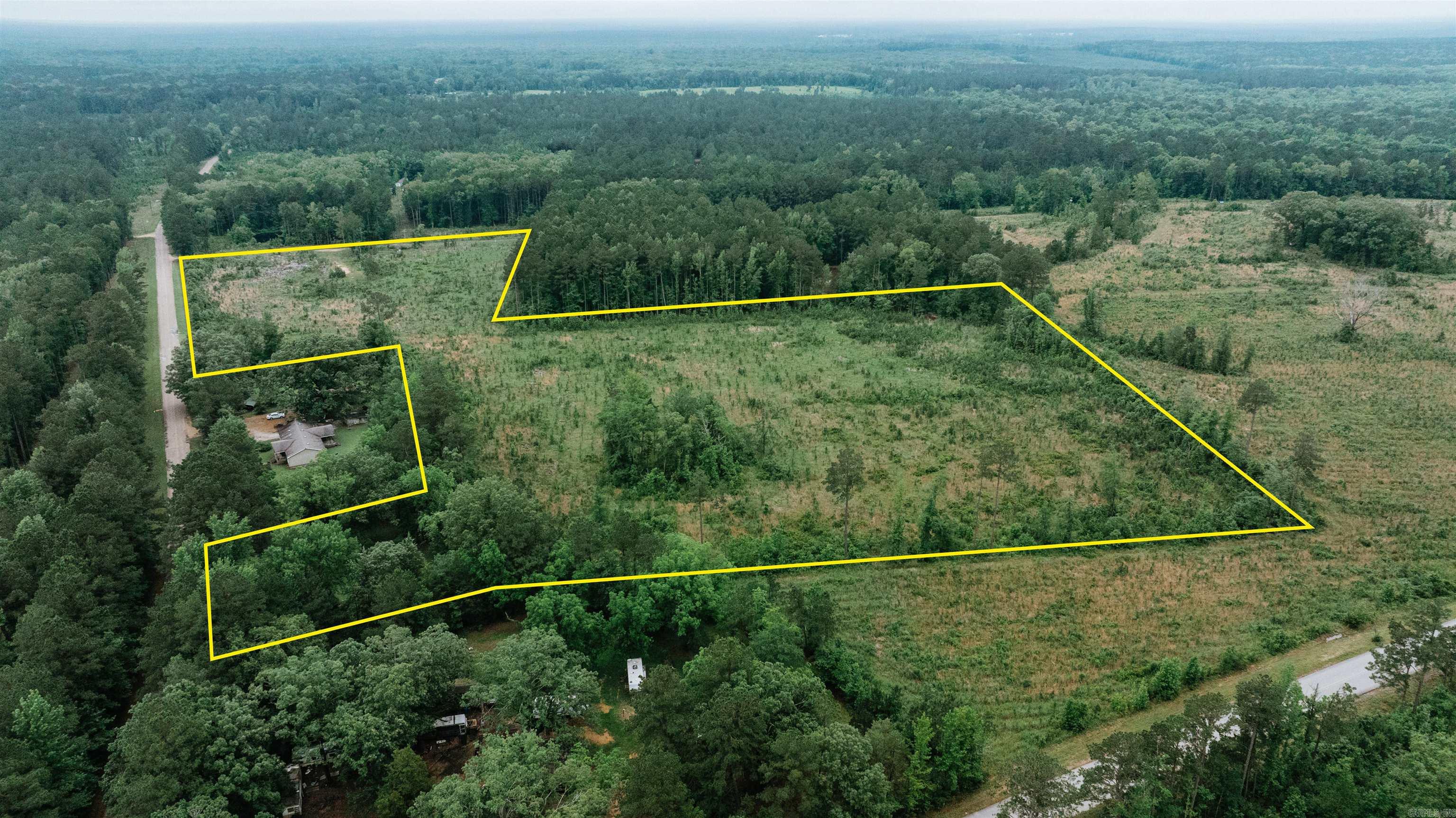 Build, Hunt, or Hold- Replanted Pine & Ready for its new owner. Here’s a solid 20+/- acre tract with a little bit of everything. Road frontage, utilities, great access, and a head start on your timber investment. Located just 15 minutes South of Camden off of Ouachita Rd. 55, this property offers a rare combo: paved frontage with electric and Fiber Optic service at the road, plus a quiet country setting that would make a great place for a forever home, weekend getaway, or hunting cabin. The tract was clear cut 3 years ago but has already been professionally replanted in pine. That gives you future timber value. Whether you’re looking to build, bow hunt, or just get your boots on your own ground, this one’s priced to sell at just $37,000. That’s only an $1850 per acre for land with road access and utilities in place.