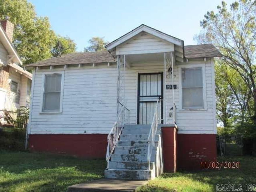 Unique opportunity with this diamond in the rough property.  Looking for an investment property will all the bones to make a cash flow cow moo.  Look no further.  WWII era original hardwoods welcome guests to visit.  Cozy Kitchen with room for a few guests. 3 nice size bedrooms and full bath say investment saving.  I a little paint and a few updates can get this one ready for nightly rental or long term rental. square footage approximate measuring is encouraged.  AGENTS SEE AGENT REMARKS.