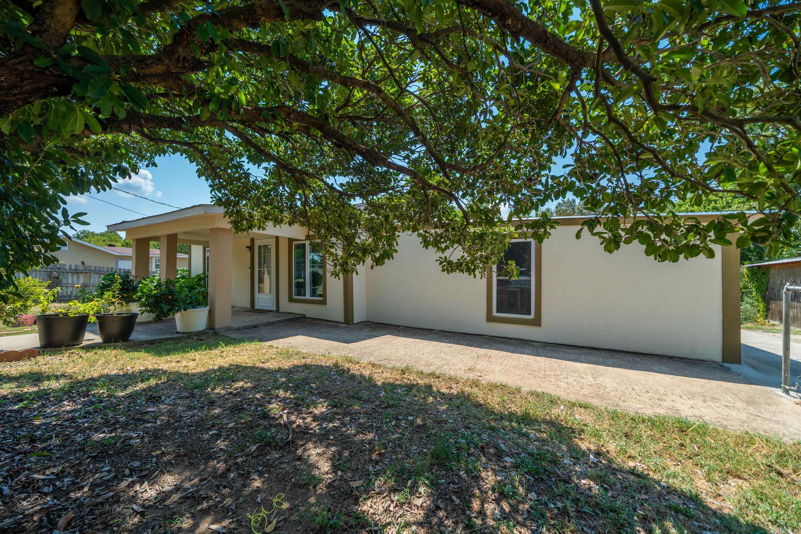This beautifully updated 4-bedroom, 1-bath home offers 1,392 sq ft of comfortable living space in a convenient in-town location. This home has been gutted from top to bottom, including all-new plumbing and electrical. The home features spacious bedrooms with an open living room/kitchen area complete with a beautiful island—perfect for cooking, dining, and entertaining. Enjoy the outdoors with a fully fenced yard, ideal for pets or gatherings, and take advantage of the large storage building for all your tools and extras. Located close to schools, shopping, and downtown, this property blends comfort with convenience.