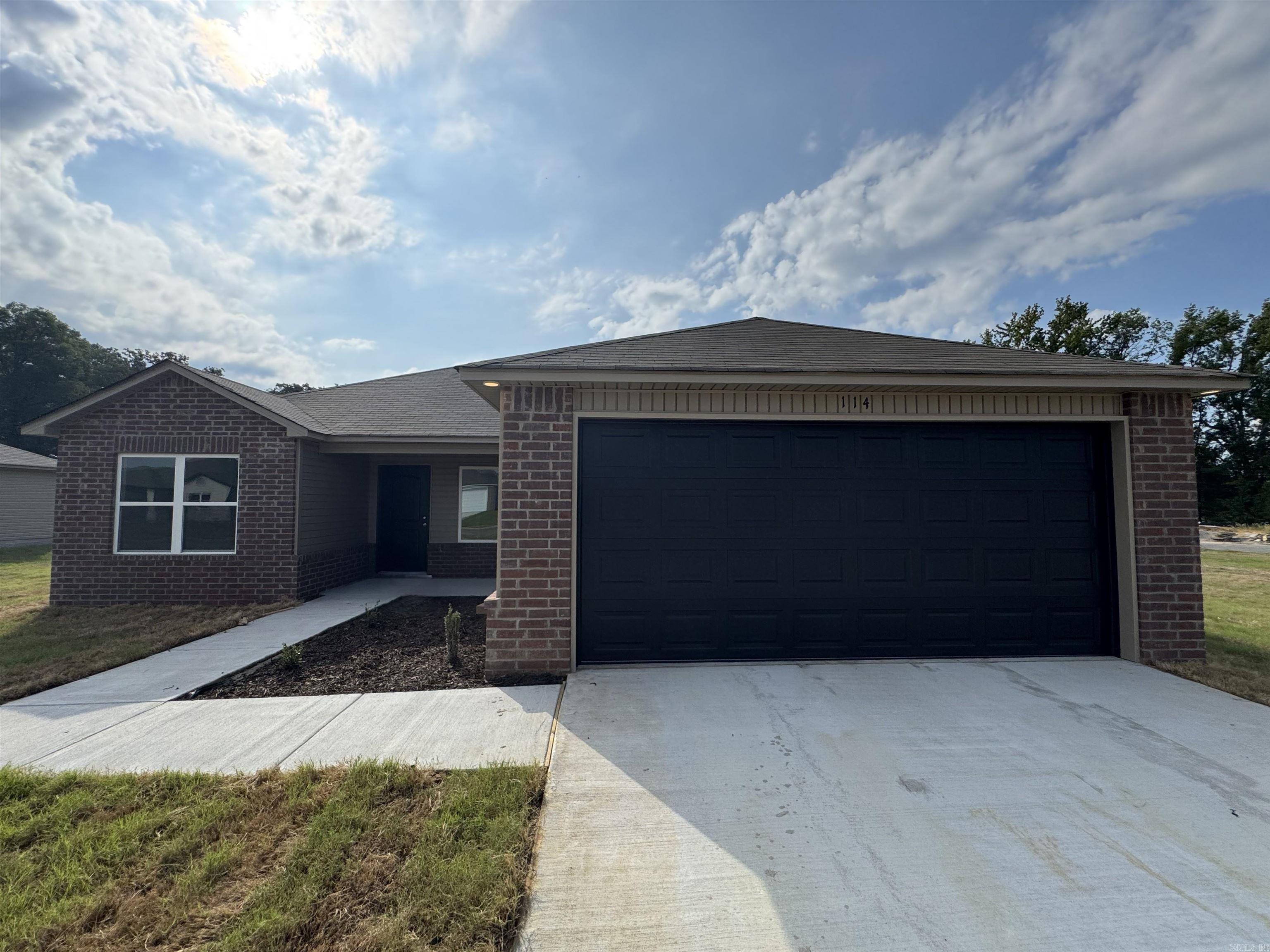 The gorgeous Lowell II plan is rich with curb appeal with its welcoming covered front porch and front yard landscaping. This home features an open floor plan with 3 bedrooms, 2 bathrooms, and an expansive living area. Also enjoy a flexible breakfast/dining area, and a beautiful kitchen fully equipped with energy-efficient appliances, ample counterspace, and a sizable pantry for the adventurous home chef. Learn more about this home today! **SEE SHOWING REMARKS & AGENT REMARKS FOR IMPORTANT INFORMATION** **SEE SHOWING REMARKS & AGENT REMARKS FOR IMPORTANT INFORMATION**