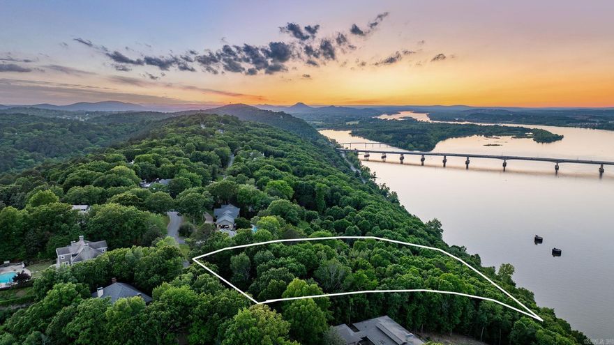 Discover one of Little Rock’s rare opportunities to own a premier homesite in coveted River Ridge. This 1.19-acre lot offers stunning skyline and Arkansas River views, providing the perfect backdrop to build your dream home. Located near the back of the neighborhood near a quiet cul-de-sac, this property combines privacy with convenience—just minutes from shopping, dining, and schools. Enjoy peaceful surroundings, breathtaking vistas, and endless possibilities for a custom home in one of the city’s most popular locations.  Come see!