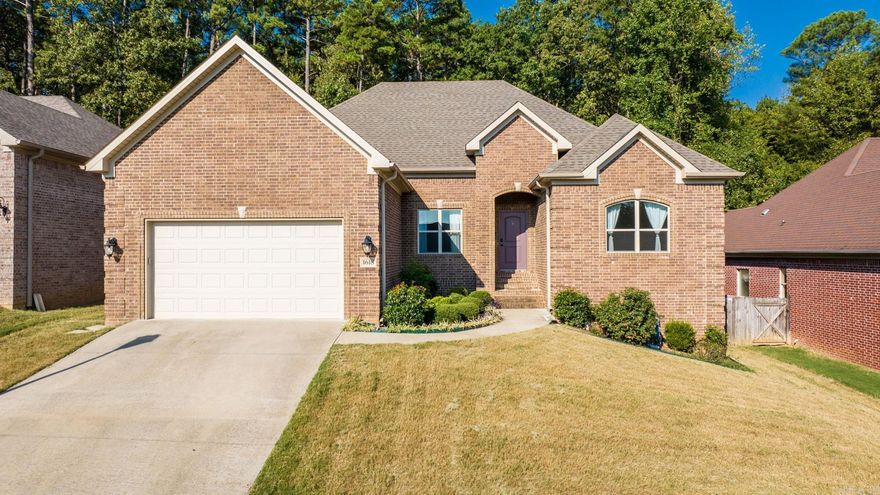 Introducing a stunning four-bedroom split-plan home, meticulously crafted in 2018. This modern home boasts a spacious living/dining/kitchen open plan, beautiful rich laminate floors throughout the main areas, and a thoughtful layout designed for both comfort and style. With it's open-concept design, beautiful gas log fireplace, and pristine landscaping, this home is sure to catch your eye. Don't miss the opportunity to make this your new home!