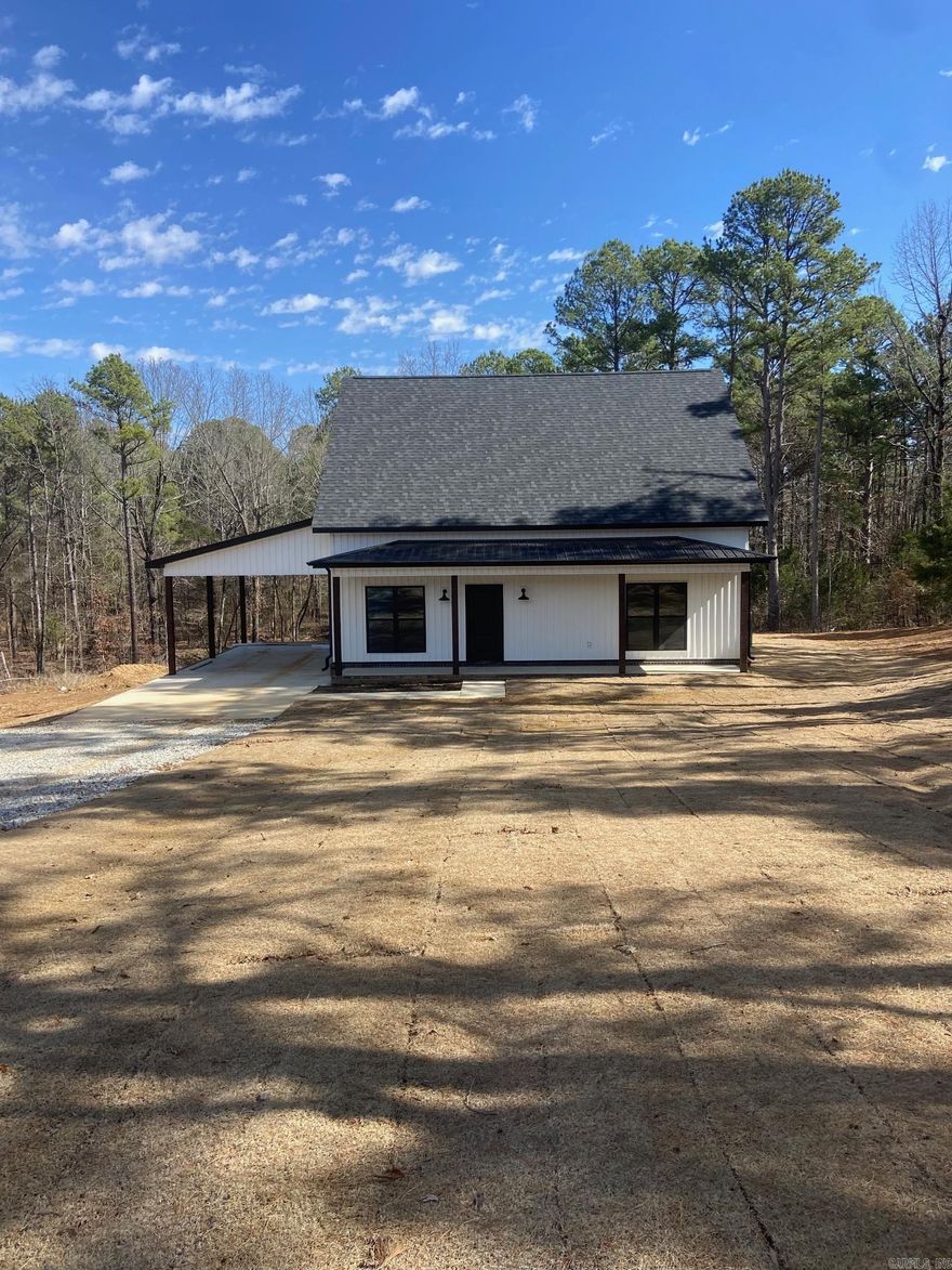New Country Farm house on almost 5 acres with lots of seclusion.  Downstairs is the Master suite, Sunroom, Open floor plan for dining, living & kitchen area.  Gas log fireplace & extra cabinets in the Laundry room.  Upstairs are the 2 other bedrooms, a full tiled bath, and 4 walk in closets. Comes with a 1 year builders warranty. Agent is owner.