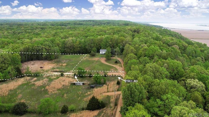 With power, water, and a new driveway into this unrestricted lot, you get to enjoy the freedom of the country without sacrificing modern conveniences.  -Owner Financing Available for $12k Down -No Restrictions! -New Driveway -Power & Water -Very Buildable: No Floodplain or Wetlands, Half Cleared -New Survey -Partially Fenced -Priced Well Below Market