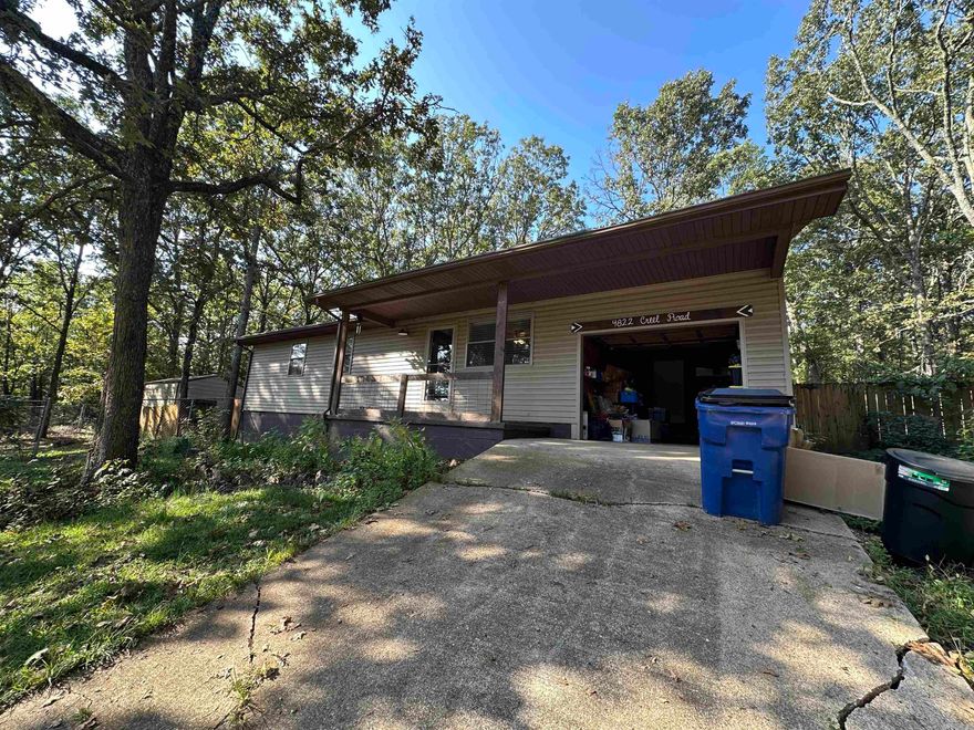 Nestled on 1.34 peaceful acres along a paved road, this inviting 3-bedroom, 1-bath home offers the perfect balance of comfort and convenience. Located just minutes from Harrison and a short drive to Ponca and the Buffalo National River, it’s an ideal spot for anyone who enjoys both small-town living and outdoor adventure. The home has been tastefully updated and is move-in ready, featuring warm, welcoming spaces throughout. Outside, you’ll love the private backyard retreat with mature shade trees, a fire pit area for evening gatherings, and a separate fenced section—great for pets, a play area, or a garden. A charming country feel with easy access to everything you need!