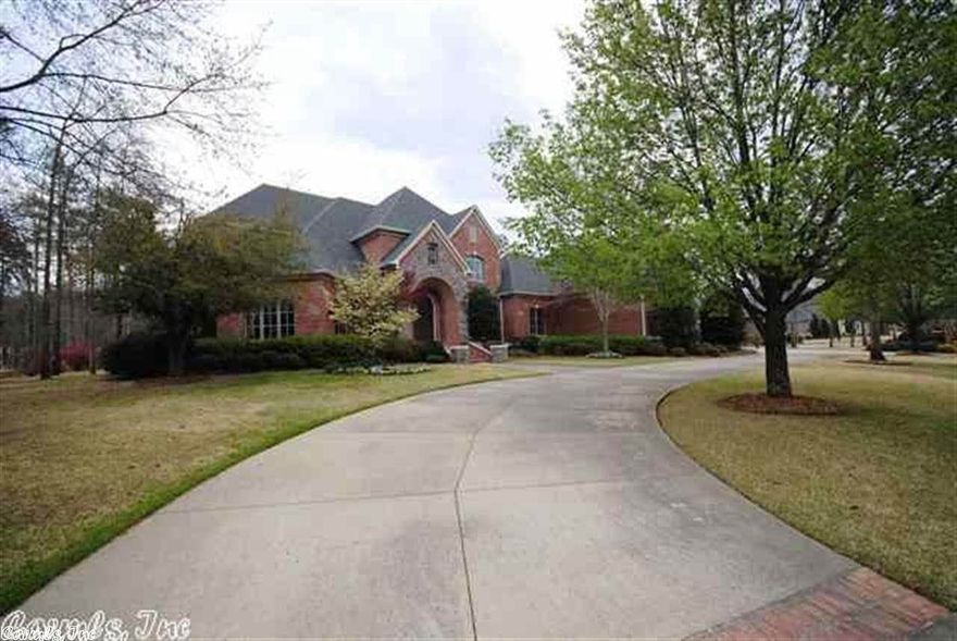 Custom Built by Kevin Hughes, for the current owners, this home features a classic architectural style while creating a comfortable family home.  Set in the prestigious Sologne neighborhood of Chenal, the home backs up to the third hole of the Bear Den golf course.  The ground floor features the foyer, formal dining room, living room, kitchen, breakfast area, den, study, master suite and guest suite.  The upstairs has two additional family bedrooms, game or media room and wine cellar.  Four car garage.