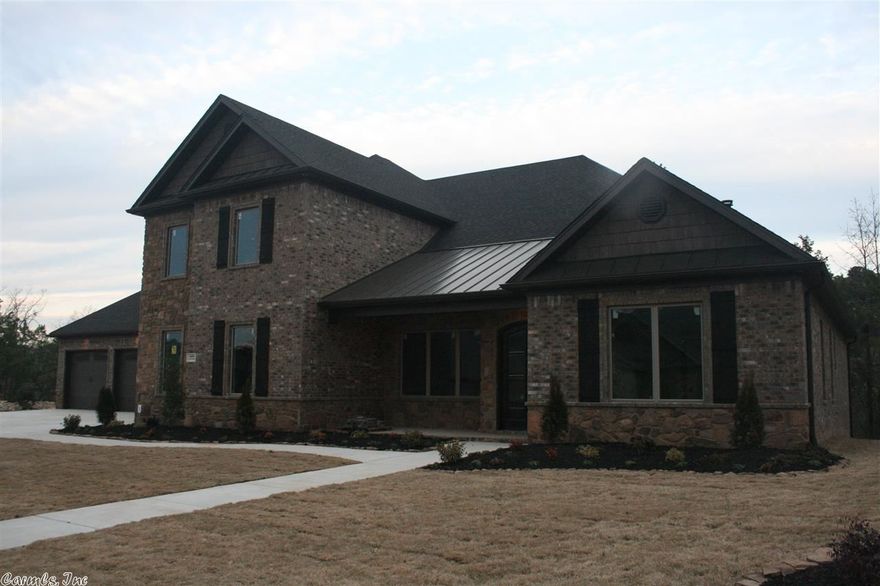 New custom built home located in the hottest subdivision in Little Rock!! This home comes w/ 4 fireplaces, granite tops, stainless steel appliances incl. all refrigerator/freezer, icemaker, wetbar, alarm system, central vac, and large picture windows. Has a media room upstairs and a mancave downstairs. Has 2nd master bed/bath for in-laws/guests. Covered back porch with vaulted wood ceilings and fireplace. A great place to entertain!! A MUST SEE!!!