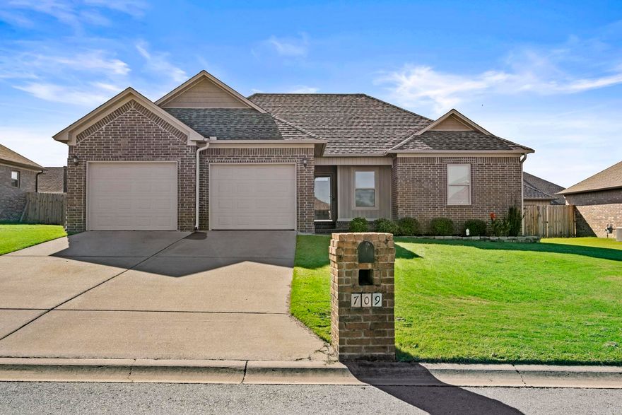 This adorable 3-bedroom, 2-bathroom home is move-in ready! Nestled in a sought-after subdivision that’s conveniently located to schools and freeway, this property includes a brand new roof, fresh paint throughout, and new carpet. The open floor plan with vaulted ceiling creates a welcoming and airy atmosphere, perfect for both daily living and entertaining. A cozy living area with fireplace, and a kitchen that invites family gatherings, this home has everything you need. Outside, enjoy a private backyard with covered deck that’s ideal for relaxation or play. Don’t miss out on this gem—schedule your showing today! Agents see remarks.