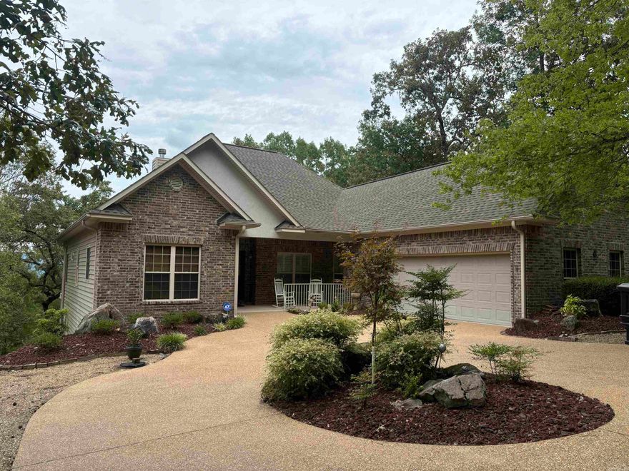 Wow what a beautiful home.  Tray ceilings and crown molding are only the beginning.  Three Bedroom, Three bathrooms, office, cooks kitchen. Everything is beautiful starting with the view in this home.  Wood floors great lighting a cooks kitchen large living area wiith a great view, Office is beautiful.  New October 22 Refrigerator, wall ovens microwave built in, dishwasher has two levels.  Trash compactor, new garbage disposal. Instant hot water in kitchen and master bath (steam shower).  Gas stove and large pantry. Full house generator/500 gallon propane tank.  New AC 10/22.,  Surround sound, central vac, tankless water heater.  Electrical closet. Doors are wheelchair accessible in-home. Lower level set for separate living space with large Cedar Closet and deck.  Stand up crawl space and wrapped pipes.  Double panel windows Alarm system.  Master suite has amazing views and large bath and closet area.  Second bedroom is a large comfortable room and closet with direct access to bathroom.  Laundry area has cabinets and sink. Lower level has third bedroom and plumbing for kitchen and a great bathroom area.  $2,000.00 buy in fee for non residents.