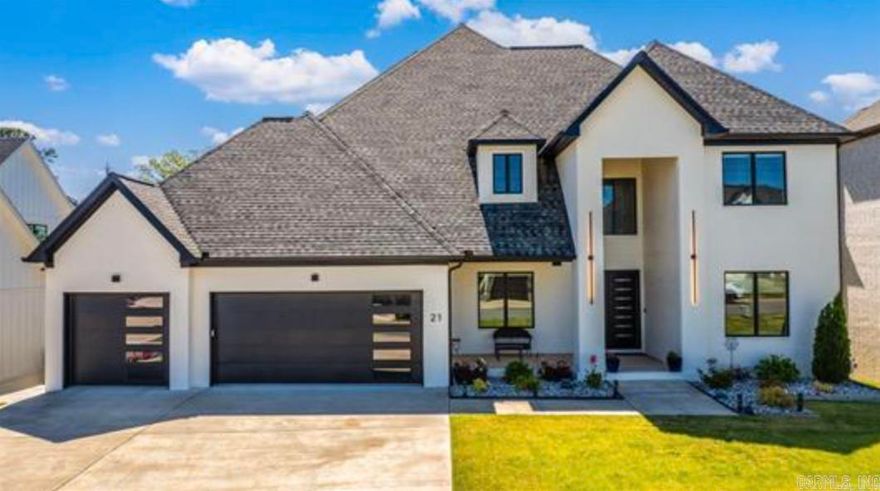 Atop Chenal’s Falstone w/ stunning views, this trophy RQM Homes build is an incredible 5 Bed, 5.5 Bath w/ 3 beds on main (each w/ private bath + closet), 2 offices, 2 laundries (1 per floor), sunroom + phenomenal flat yard.  Inside: immediately impressive 2-story foyer w/ imperial pecan floors. 3 beds down (each w/ private bath/closet). Immaculate living: tall tray ceiling, ship-lap benched fireplace + Pella windows w/ smart shades.   Chef’s kitchen: waterfall island w/ prep sink, butcher block pull-out system, pot filler, Monogram gas stove, 2 convection ovens, butler’s pantry, +.5 bath. Sunroom w/ meditation closet. Gorgeous veranda: granite set gas grill & cooktop + iron steps to flat, fully fenced yard w/ playground, covered porch.  Private on main lvl: primary suite w/ stunning views + motion recessed lighting, 2 vanity +knee-space +sliding storage cabinets, walk-in seated 4-head shower, +his/her closets w/ lockable cabinets.  Up: Playroom + office + theatre w/ 12’ bar +wet bar, beverage cooler, 4K projector, surround + acoustic pass-through speakers + 150” screen.  *2 EV (240V) charging stations + 4K 4-Camera Smart Security + walk-out crawl w/ vapor barrier & dehumidifier.
