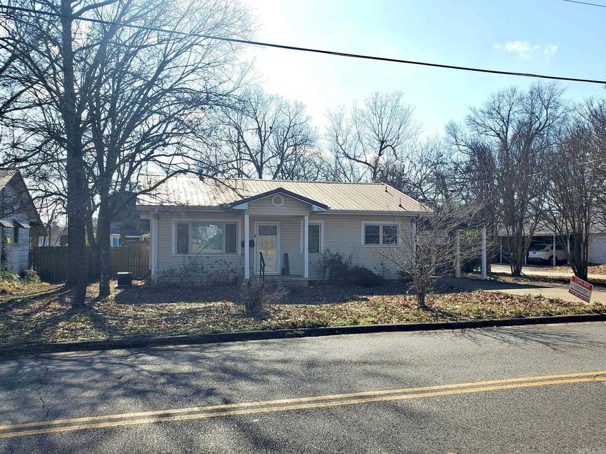 Nicely updated 2 bedroom, 1 bath home in Mena with low-maintenance features and move-in appeal. Remodeled in 2014, this charming home offers vinyl siding and a durable metal roof, giving you long-lasting protection and easy care. Inside, you’ll appreciate the tasteful updates and newer windows that help with energy efficiency and natural light. A single carport keeps you and your vehicle out of the weather, with convenient access into the home. Whether you’re a first-time buyer, downsizing, or looking for an investment property, this cozy, well-kept home is an excellent choice in a convenient Mena location.