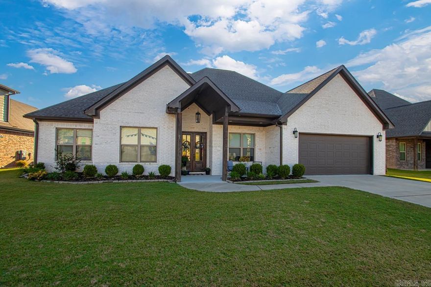 BEAUTIFUL, one level home located on the lake in Hurricane Lake Estates!  This home was custom built in 2021!  This home has over 2700 sqft with 4 bedrooms & 2.5 baths.  This home has a open floor plan.  Kitchen has granite countertops, built in gas stove, wall oven, & microwave.  The cabinets go to the ceiling!  The upper cabinets have glass & lights located in them.  Plenty of cabinets with under counter lights.  There is a very large pantry for extra storage!  The guest bedrooms are definitely oversized!  Living room & kitchen both overlook the lake!  Primary bedroom is separate from the guest bedrooms.  Primary bath has separate vanities, tile shower, & soaking tub.  Primary closet is AMAZING!!!  It is HUGE!  There is tons of space in this closet!!!  You will love it!  The primary bedroom, bath, & closet flow into the laundry room.  Laundry room has plenty of closets.  Outside there is a nice covered back patio with an outdoor fireplace!  Large flat backyard.  Iron fence surrounds the backyard.  You have access to walk from the backyard to the lake! Definitely one you need to see!!!