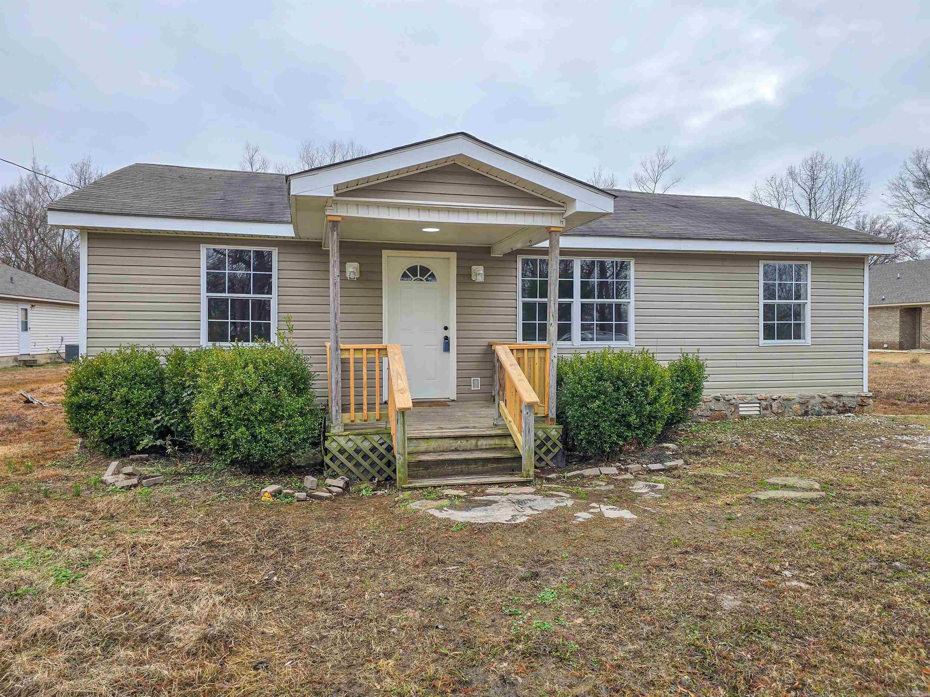 Cute as can be is this quaint 2 bedroom & 1 bath home with living room, kitchen & dining combo. Includes nice little touches like linen closet outside the bathroom, crown molding, updated LVP flooring as well as new carpet and covered front porch. The large bath has the separate laundry room with plenty of space for not only doing laundry but for ironing, folding and sorting. All of this on a large lot that has plenty of room for that future shop building you may want to add.