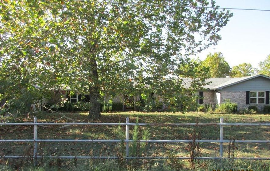 Great Brick home that has lots to offer.  This home has 5 bedrooms and 2 baths.  Kitchen has been updated with new cabinets and granite counter tops.  Woodburning fireplace in living room.  Inground pool with pool house.  Home has double garage and detached carport.  Call today for your personal tour! **AGENTS see remarks** “Property was built prior to 1978 and lead based paint may potentially exist