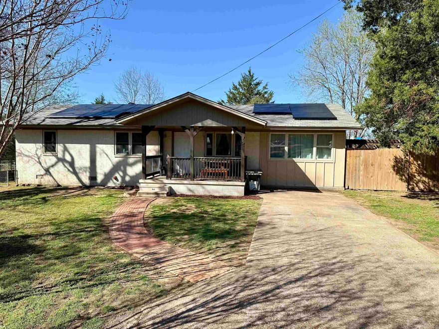 Charming and move-in ready 4-bedroom, 2-bath home nestled in a quiet cul-de-sac! This inviting property features a welcoming front porch; inside you'll find a warm and comfortable layout ideal for both everyday living and entertaining. Step out back to enjoy a spacious deck overlooking peaceful pastureland, offering beautiful views and added privacy. The fully fenced backyard provides plenty of space for pets, play, or gardening. Energy-efficient solar panels add long-term savings and sustainability. With its desirable location, thoughtful features, and serene surroundings, this home offers the perfect blend of comfort, convenience, and country charm.