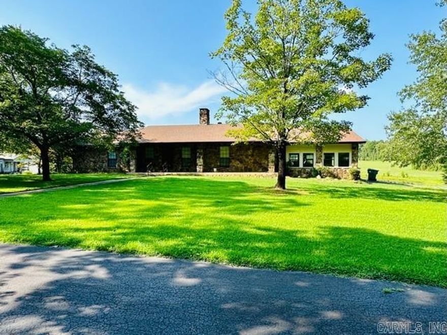 Quiet Country Living with Great Scenic Views!  Escape to peaceful country living in this spacious 3-bedroom, 3-bath home nestled on a beautiful property complete with a pond, shop, and storage buildings. Enjoy tranquil evenings on the amazing back deck, the perfect spot to relax or entertain while taking in the serene water views.  Inside, the home offers a welcoming kitchen with a breakfast area, a separate dining room that could also serve as an office or bonus room, and a large living area featuring a wood-burning insert for cozy nights.  The fully finished basement is a true bonus—complete with its own kitchen area, breakfast bar, and a spacious living space ideal for a game room, den, or guest suite. Step out onto the covered patio accessible from the basement for another beautiful view of the pond.  This property has it all—comfort, functionality, and room to spread out—all surrounded by the peaceful charm of country life.