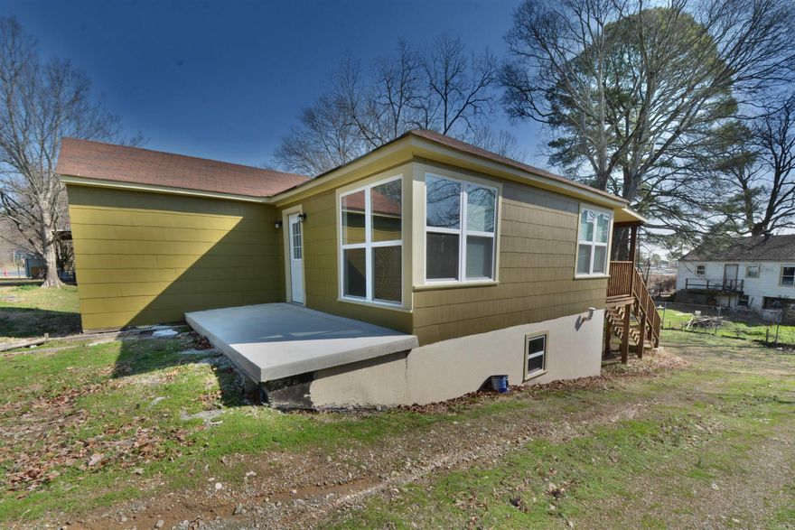 FRESHLY REMODELED HOME WITH NEW WINDOWS, STAINLESS STEEL KITCHEN APPLIANCES, TILED IN SHOWERS, FRESH PAINT, LED LIGHTING, HARDWOOD FLOORS, WITH LARGE BASEMENT AREA (850 SQ FT) DOUBLE DOORS OUT THE BACK.REAR DECK FOR ENTERTAINING & GRILLING.