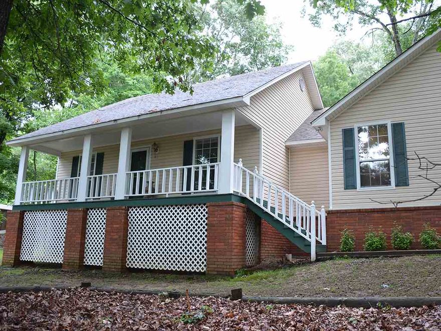 This home has a country feel but just 3 miles from I-40 and close to Conway shopping. Incredible backyard with dogwood trees galore. Loads of Azalea bushes that creates a beautiful flower garden in the spring. 25 ft. Inground pool and a 24'x30' shop with water and electricity that sits on over 2 acres. New stainless steel appliances and refrigerator. New corian countertops and stone backsplash. Custom built kitchen cabinets and pantry with plenty of pull out drawers.