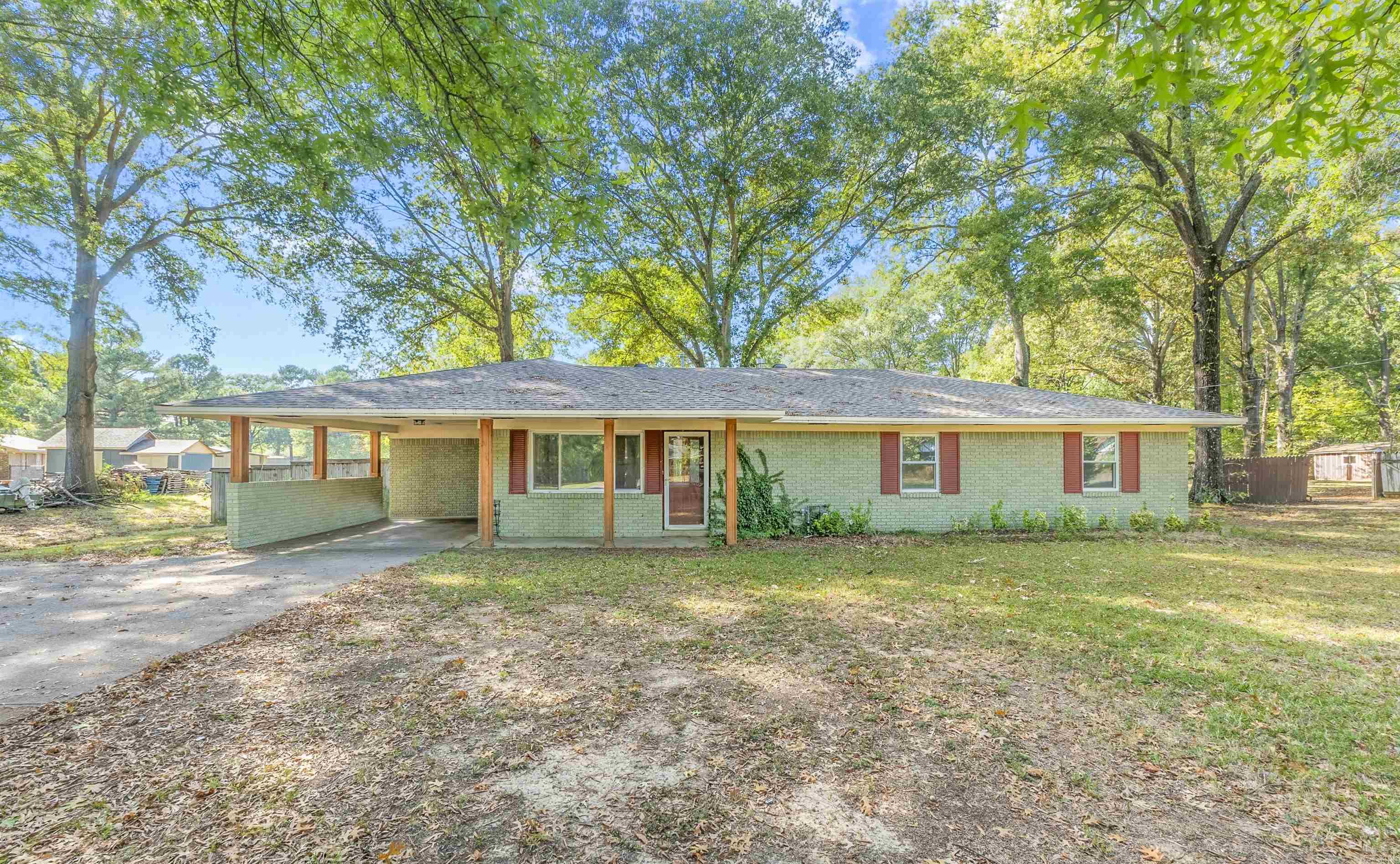 Come view this beautiful home in central Conway on over half an acre! The entire home has been remodeled. This house has a 2021 roof, 2019 HVAC, 2022 hot water heater, stained concrete floors, granite counter tops throughout, new 2020 windows, covered back porch with added ceiling fans, privacy fence, all electrical rewired in 2020. Additional side parking area and storage shed in the back. Live close to all the Conway amenities but enjoy privacy on .56 acres! Schedule your showing today! Agents see remarks.