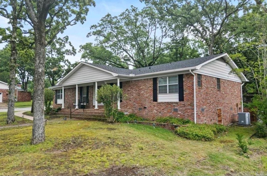 Motivated Seller! Two year home warranty offered with a rate buy down option! Step into newly-renovated modernized 3-bed/2-bath home on a spacious corner lot in a highly walkable neighborhood! And an added bonus-Location! This gem is only an 8-minute commute to downtown Little Rock, and mere minutes from shopping/groceries on McCain & JFK, making quick work of weekly errands! From your arrival, the rare double-door entry sets the tone for the striking interior. Inside, you'll find the sunroom of your dreams (perfect for morning coffee!), and a thoughtful blend of elegance in high-end marble tile & hardwoods! An entirely new kitchen features brand-new appliances ā including a double oven with built-in air fryer ! New bathrooms offer gorgeous finishes, and oversized windows throughout the home bring abundant light. A brand-new garage adds abundant storage, and a new security system brings peace of mind.This large one-story checks all your boxes - elite modern updates & a location that conveniently combines both work/play in downtown Little Rock, with the peaceful ease of suburban life. This perfectly-located, spacious, entirely-renovated dream home is awaiting you!