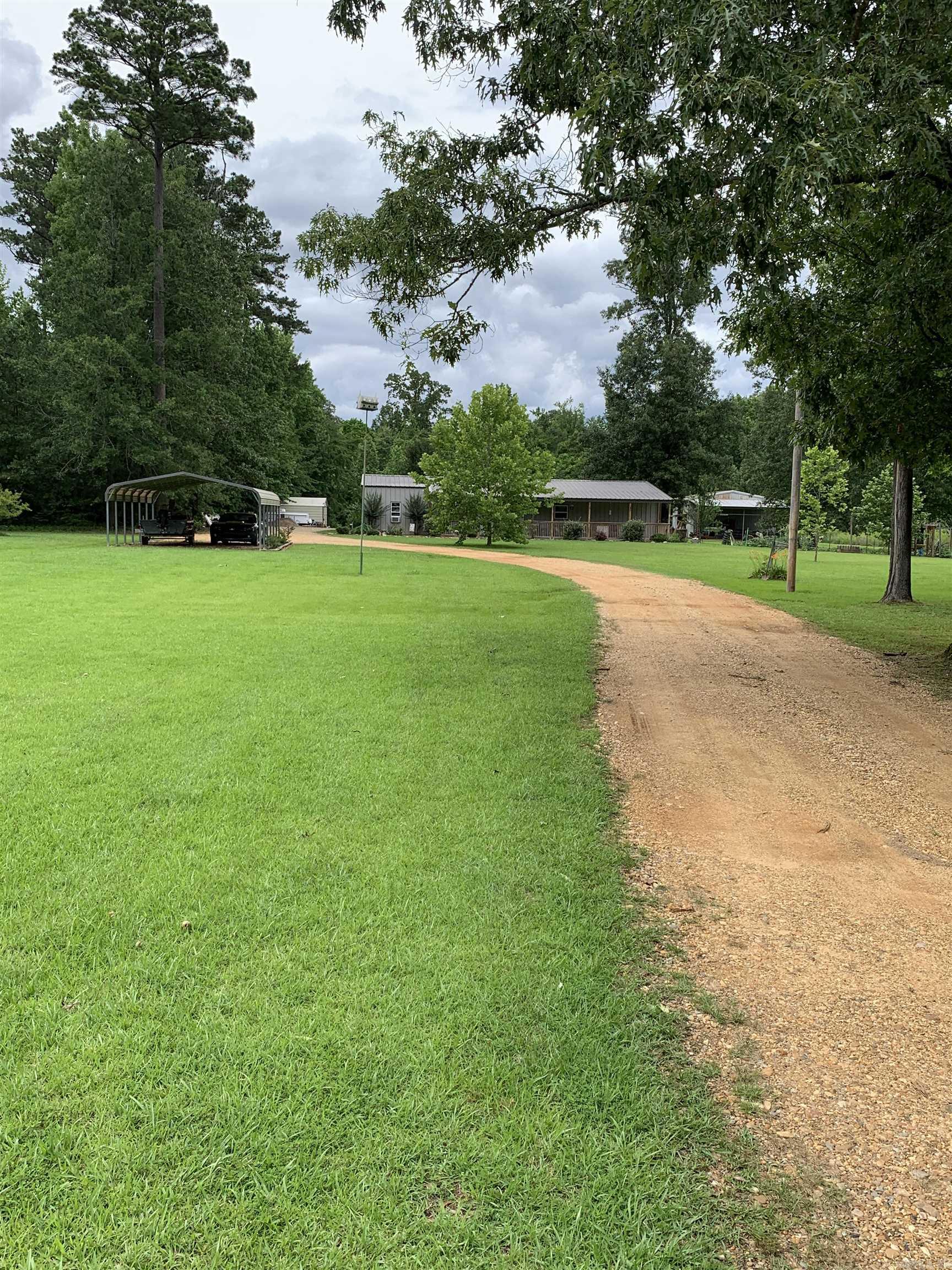3 bedroom / 2 bath Shop home. Large lot with great landscaping. Shop included. Storm Cellar. See agent remarks