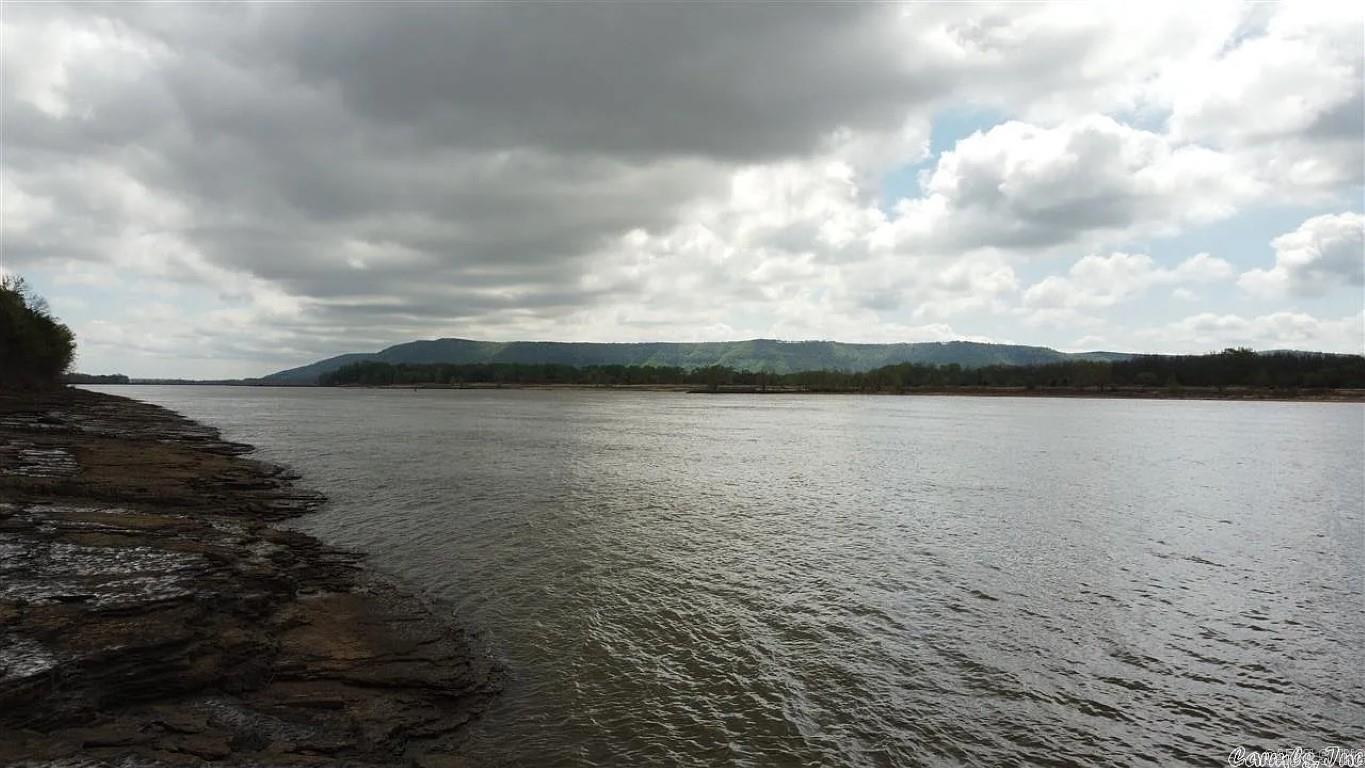 Stunning 3.86-acre property on the Arkansas River with breathtaking views of Petit Jean Mountain! A perfect homesite, this unique parcel features a dramatic 10-ft bluff leading to a scenic rock ledge along the riverbank. Enjoy peaceful riverfront living, stunning sunsets, and unmatched natural beautyāideal for your dream home or weekend retreat. A rare opportunity to own riverfront with a view! Additional adjacent acreage available.