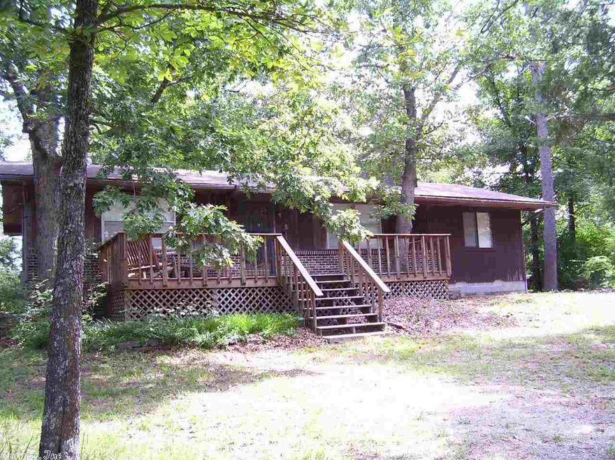 Very affordable, 3 bedroom, 1.5 baths, CH&A, plus a lovely stone fireplace.  This home offers great location, close to historic court square and music, with a nice private setting.  City utilities, pretty tree shaded property, lay good.  A must see to appreciate.