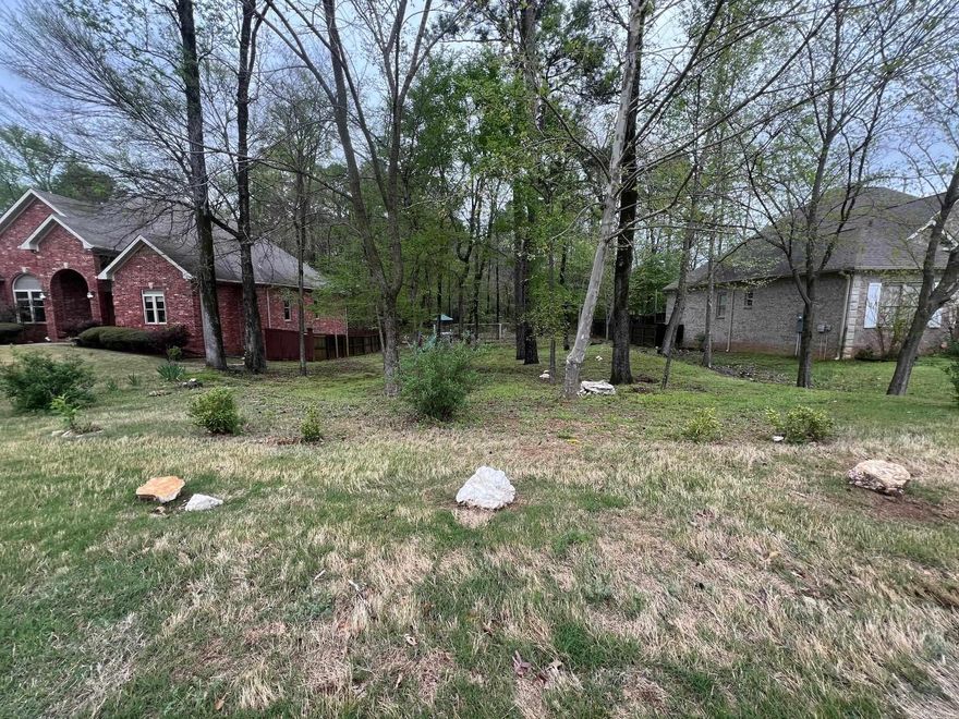 Build Your Dream Home in Prestigious Hurricane Lake Estates! Welcome to one of Saline County’s most sought-after gated communities, where luxury living meets everyday convenience. This lot offers the perfect opportunity to create a custom home tailored to your lifestyle. Residents of Hurricane Lake Estates enjoy access to a wide range of amenities, including a sparkling community pool, clubhouse, tennis courts, and private lake access for boating, fishing, or simply relaxing by the water. With well-maintained streets, upscale homes, and a strong sense of community, this is more than just a place to live—it's a place to thrive. Conveniently located near top-rated schools, shopping, dining, and easy access to Little Rock. Don't miss this rare opportunity to own a piece of paradise in Hurricane Lake Estates! Home next door at 5410 Lexington is also available