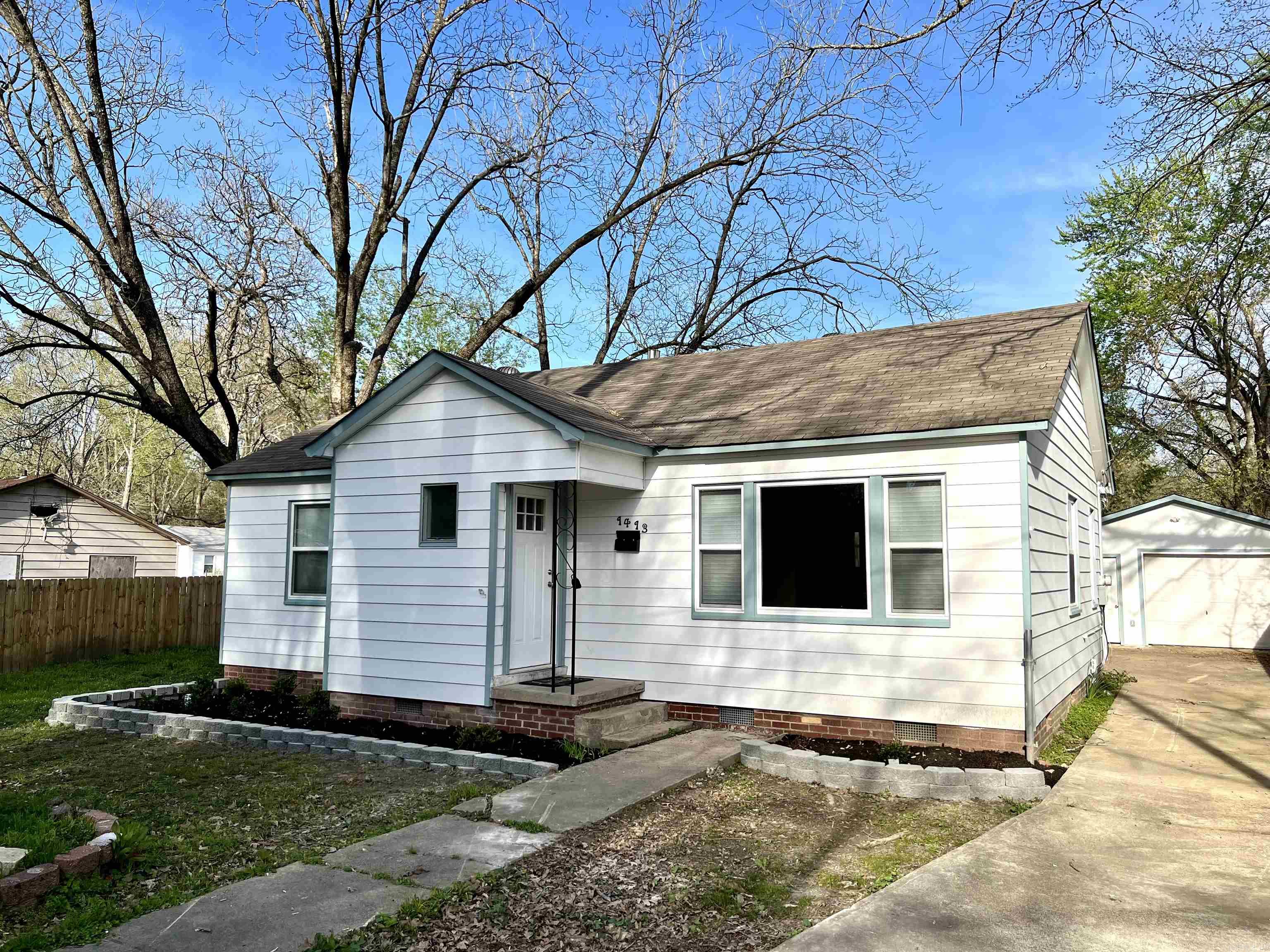 Looking for a move-in ready home in Malvern? Look no further! This gorgeous, remodeled home on quiet street is waiting for YOU! Welcome to 1413 Porter St. This home is a 3bed, 2bath with ample space for your family. As you enter the home you are greeted with a large living/dining space boasting a breakfast bar with a butcher block countertop. The kitchen has tile backsplash with new cabinets and a durable marble look laminate countertop. The new appliances, including a stove, dishwasher and refrigerator convey with the property. All new interior and exterior paint provide a fresh and bright feeling. New energy efficient windows and 2 tankless water heaters help to keep your energy costs down. New vinyl plank flooring has been installed throughout making the home feel modern and sleek. The 2 new bathrooms are both a nice size, the master with a walk-in shower and the guest bath has a tub/shower combo. New PEX plumbing lines were also installed as well as new outlets and switches. The one car garage is oversized at 19x23 having a workbench and storage space for all your tools and yard equipment. The new wood fence provides privacy to your yard. Call today for your tour.