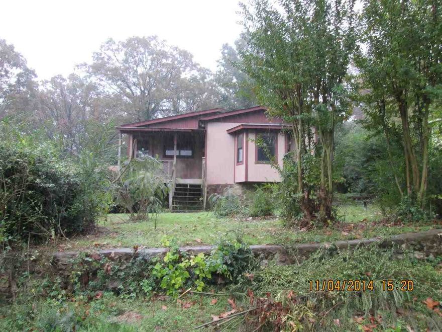 Bank Owned - Great investment opportunity in this 2 bedroom 1 bath home with attached carport, living room, kitchen/dining combo, utility room on the rear.  Located close to I-40 for easy transportation to work, retail and Burns Park!  Property sold AS-IS, no disclosures or warranties available.  Agents see confidential remarks for showing instructions and additional information.