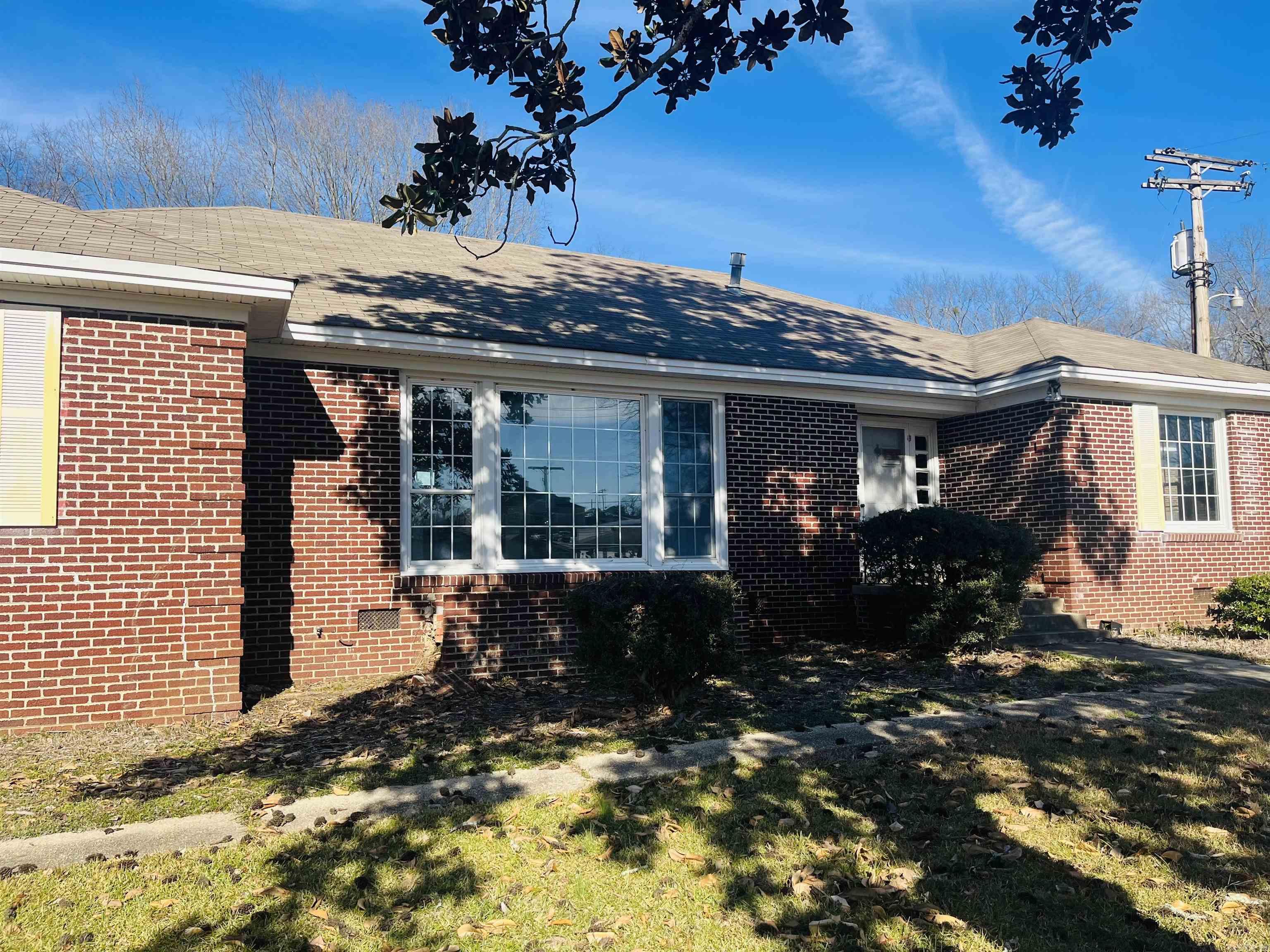 Charming Brick Home with Character and Space!  This beautiful brick home features original hardwood floors throughout, offering a warm and inviting atmosphere. With 3 spacious bedrooms and 2.5 bathrooms, there’s plenty of room for family living. The home has been recently updated with new paint and lighting, giving it a fresh, modern feel while maintaining its classic character.  Looking for even more space? You’ll love the bonus room/office, perfect for work or play. The large master bedroom has a spacious master bath for ultimate relaxation. Plus, a garage adds convenience and extra storage.  If you're seeking a home with character and room to grow, this could be your new address! Call the listing agent today to schedule your tour.