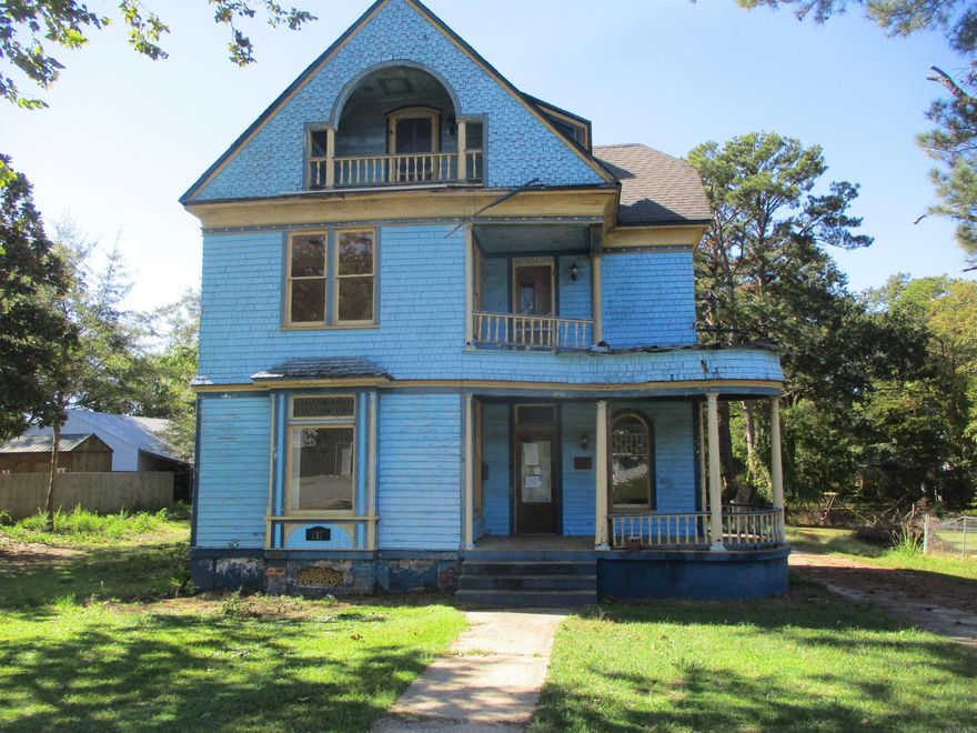 Don't miss out on this great opportunity to own a home and make it your own!  This 2.5 story home is on the National Registry of Historic Places (see Associated Docs), known as The Hotchkiss House, features custom, detailed woodwork in the entry from staircase to fireplace casings/trim, and has 4 bedrooms, 2.5 baths, with 2 living areas, dining room, covered front porch and balconies. This property is eligible under the Freddie Mac First Look Initiative through 12/14/2025. No disclosures available. All offers must be accompanied by proof of funds or lender approval letter. Property being sold as-is. **Agents please READ agent/confidential remarks section for additional information and showing instructions** SqFt and lot size are per tax records, but not guaranteed.