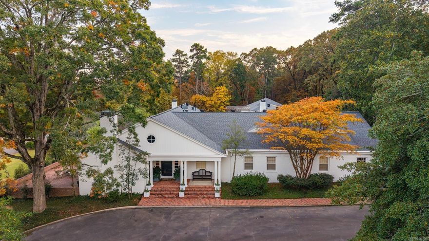 SBL. Gracious home with super special recent addition. Beautiful foyer with marble floors, beautifully proportioned formal living room dining room with an open kitchen to family room and cozy den.  The master bedroom and additional en-suite bedrooms are on the main floor.  Upstairs includes 2 additional bedrooms and bathrooms and a bonus room.  This house is situated on 2 lots, beautifully terraces, landscaping and a 3-car garage & a 48KW generator.  Addition includes large gameroom, music room, exercise room with sauna and fabulous two-story porches that open to gorgeous new swimming pool.  Property comes additional wooded lot co-owned with neighbors.  Truly exceptional home.