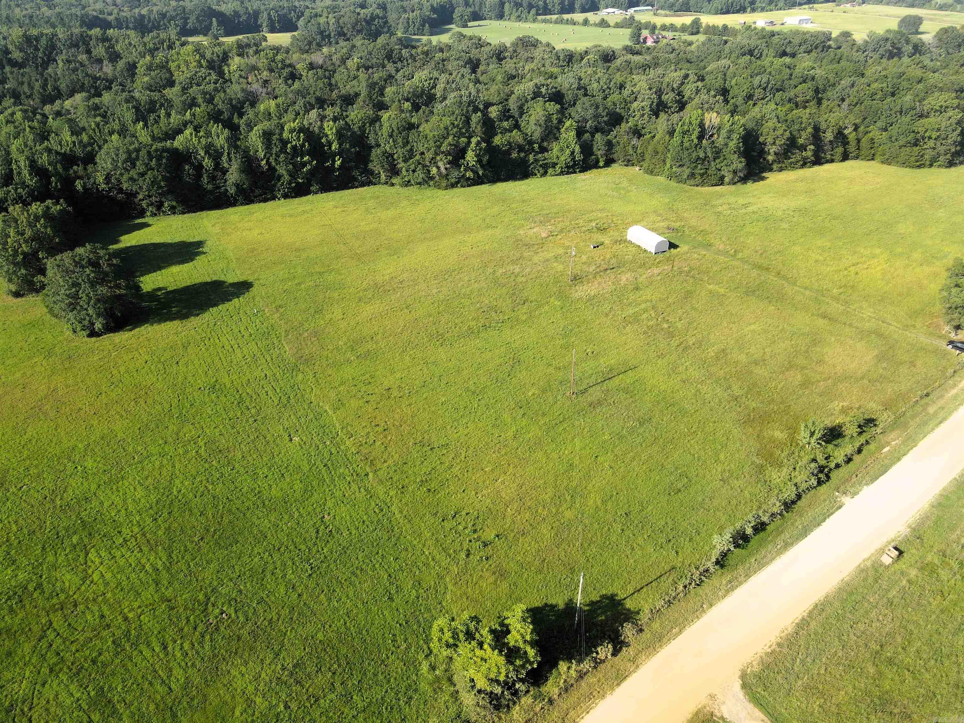 - 9 +/- acres of pasture - 11 +/- acres of timber - Numerous build sites - Electric, rural water, and septic on the property - Mature hardwood mix - Heavy mast producing trees - County road frontage - Mostly flat topography - Wet weather creek - 10 miles to Greenbrier - 14 miles to Conway