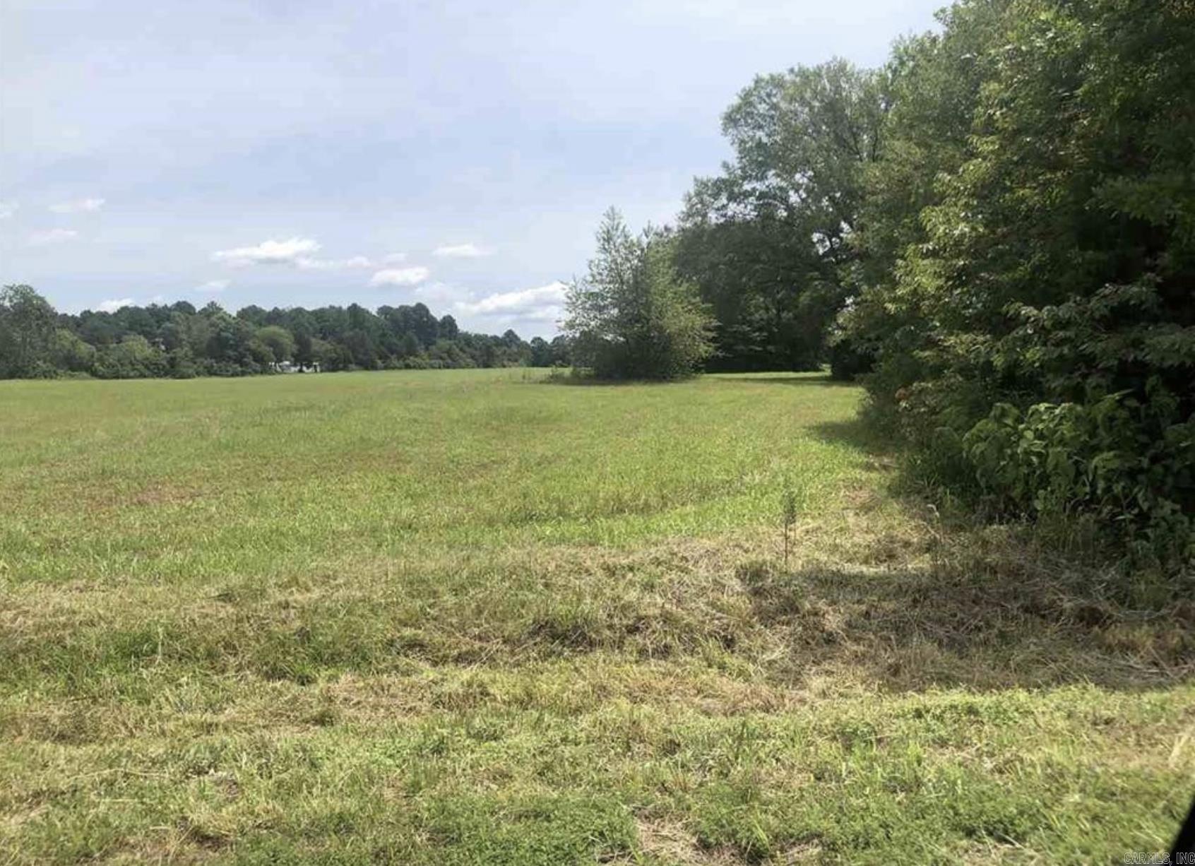 Zoned C-3, the property offers numerous possibilities for commercial development. Its convenient location being only minutes from I-40, Industrial Park, hospitals, and downtown area is attractive for a business seeking visibility and accessibility. This is a great property for storage units for boats or RV's. This property has great portential and there is additional acreage available. See survey attached to documents. Call listing agent for more information.
