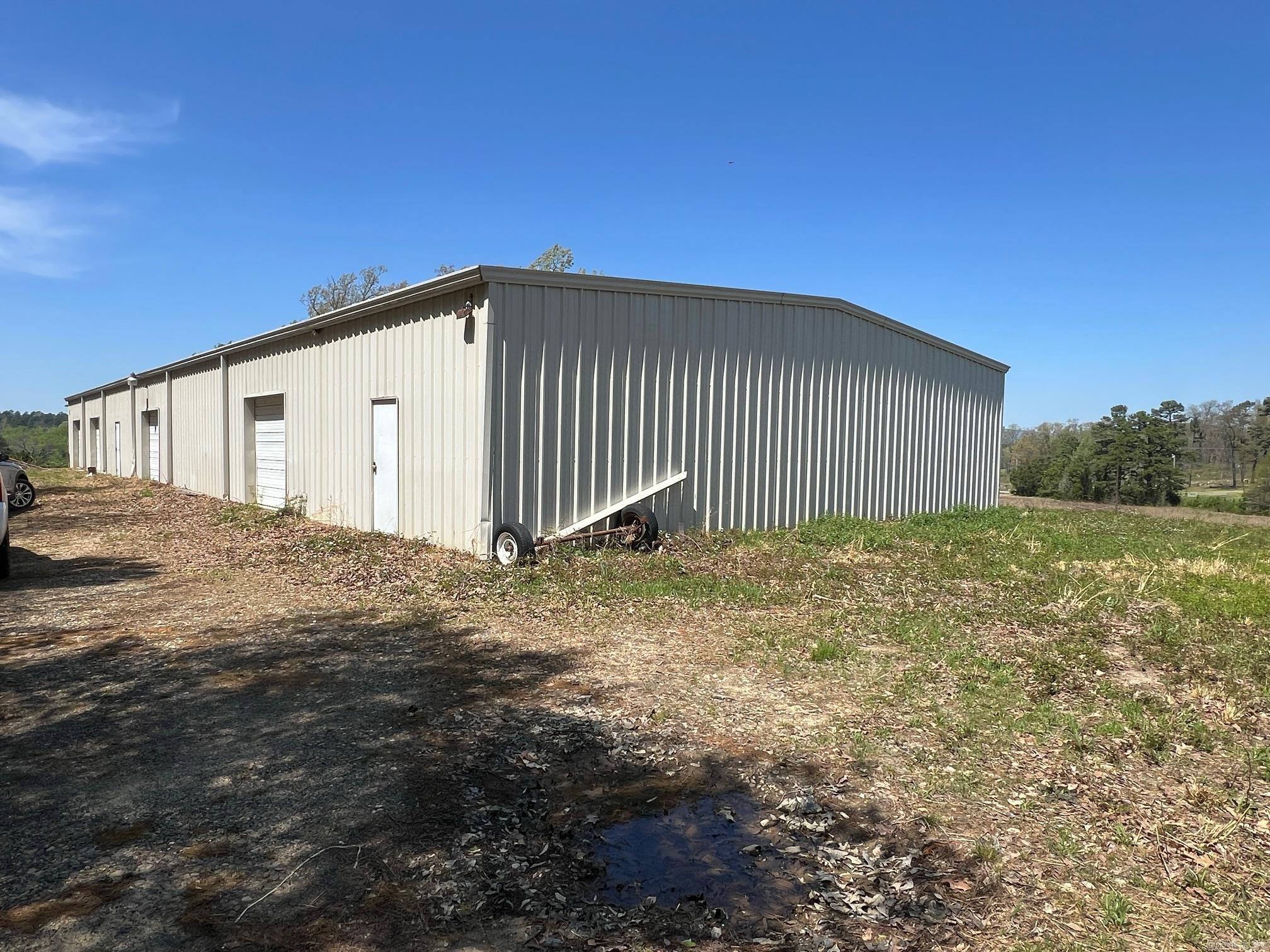 Nice warehouse and land adjoining Mena Airport. Property shown by appointment only.
