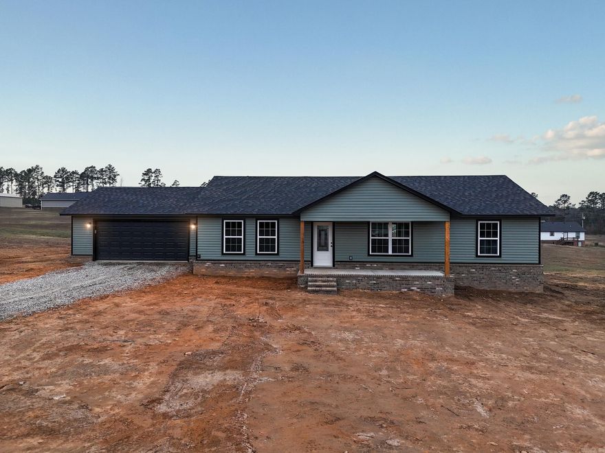 Beautiful new construction featuring 3 bedrooms, 2 baths, and a split floor plan designed for comfort and privacy. The open-concept living, kitchen, and dining area creates an easy, welcoming flow throughout the home. Located just outside the city limits, you’ll love the quiet setting while still being close to town.